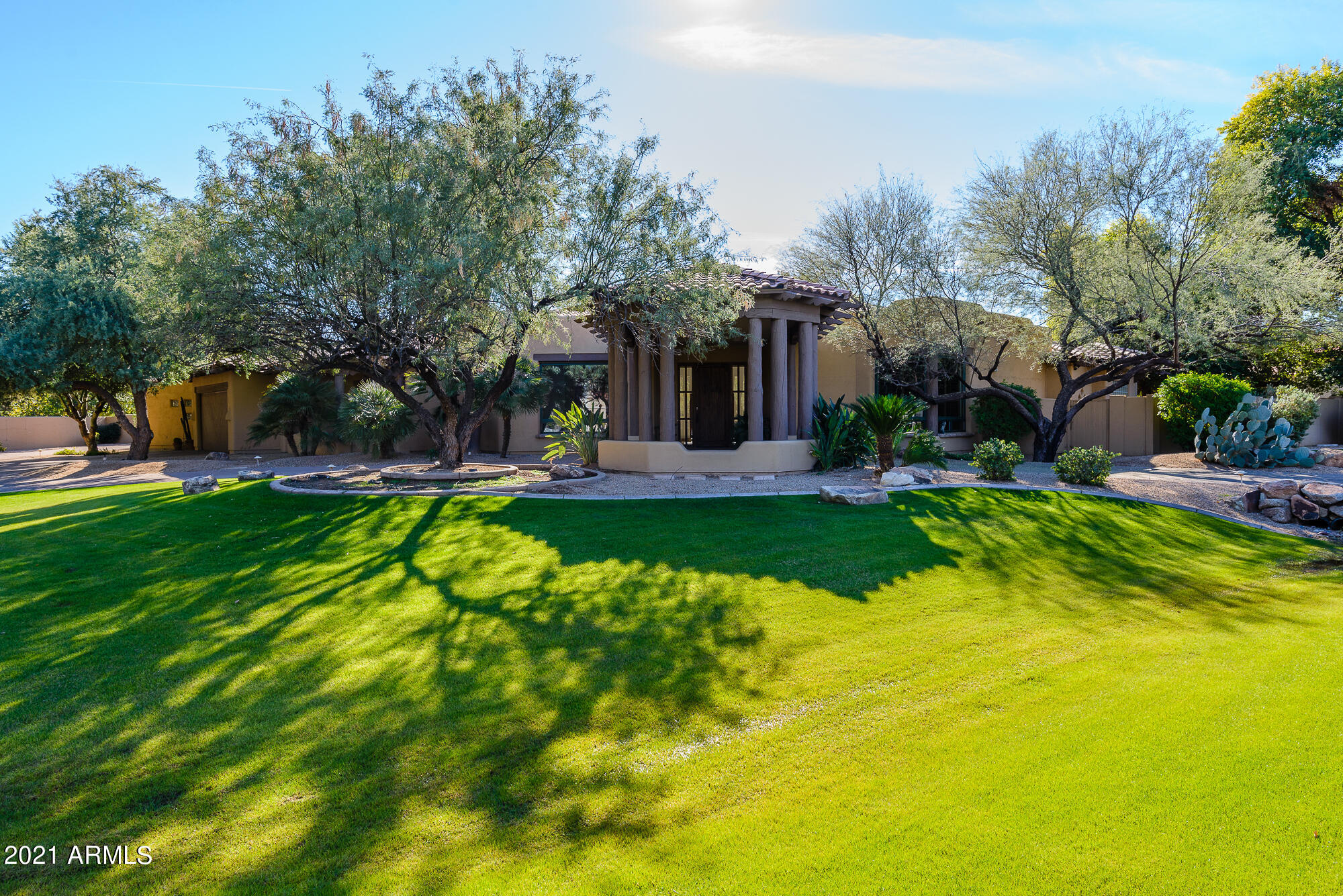 Gated luxury in Hidden Paradise. 7000+ sq.ft  boast 4 en suite bedrooms, office/5th bedrooms with bath, generous formal spaces, grand kitchen open to family room w/ fireplace, Large game room with wet bar and 1/2 bath, 4 car garage, resort style back yard  with waterfall pool & spa. Plenty of room for expansion , multiple garages or easy split for a connected casita, new roof 2020, impeccably maintained.