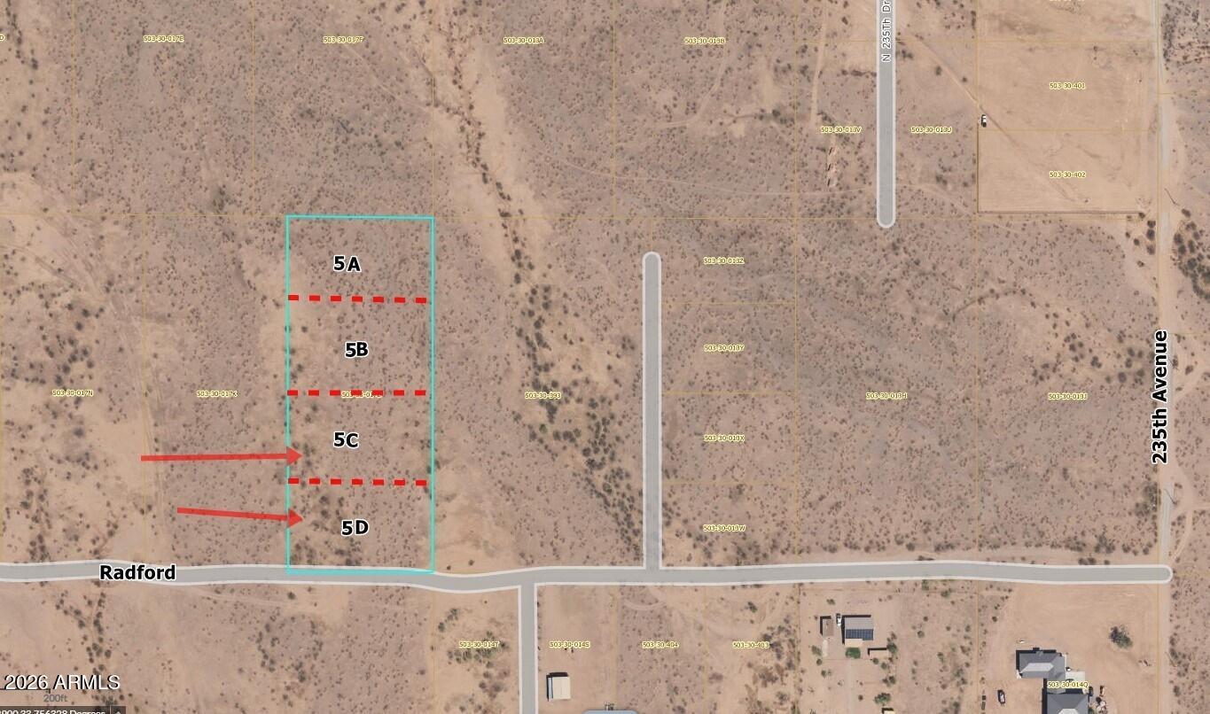 Nice flat 2 Acres already surveyed into 2 lots in a rapidly developing area of Wittmann!  2x lots north of this already under contract.    Price includes 2 wellshares!   Access into this area is really nice, with pavement for a good stretch of it, then a rocked road the rest of the way.   This is a perfect setup to put up homes in this area!  This is going to be a busy street with all of the plans in place for several developments; this property will be right in the middle of all of them!  Survey attached in documents.  Power currently at 235th Avenue.  *Has been under grazing lease,  so taxes will rise.* An owner of this property hold an AZ real estate License.