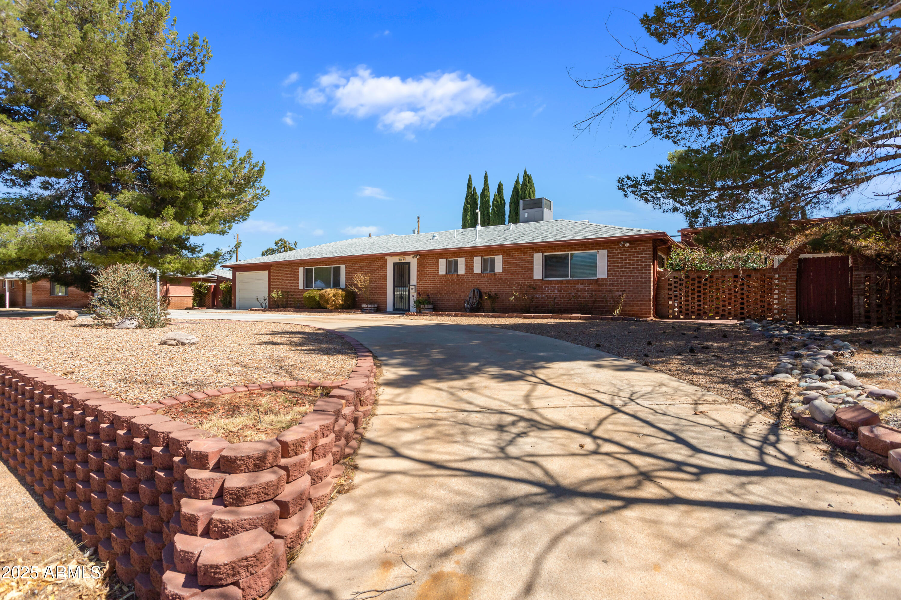 Don't miss out on this hidden gem!  Enjoy the large indoor pool year round! This four bedroom  and 3 bathroom home has a mother in law suite, beautiful Arizona room with a wet bar and tons of living space!