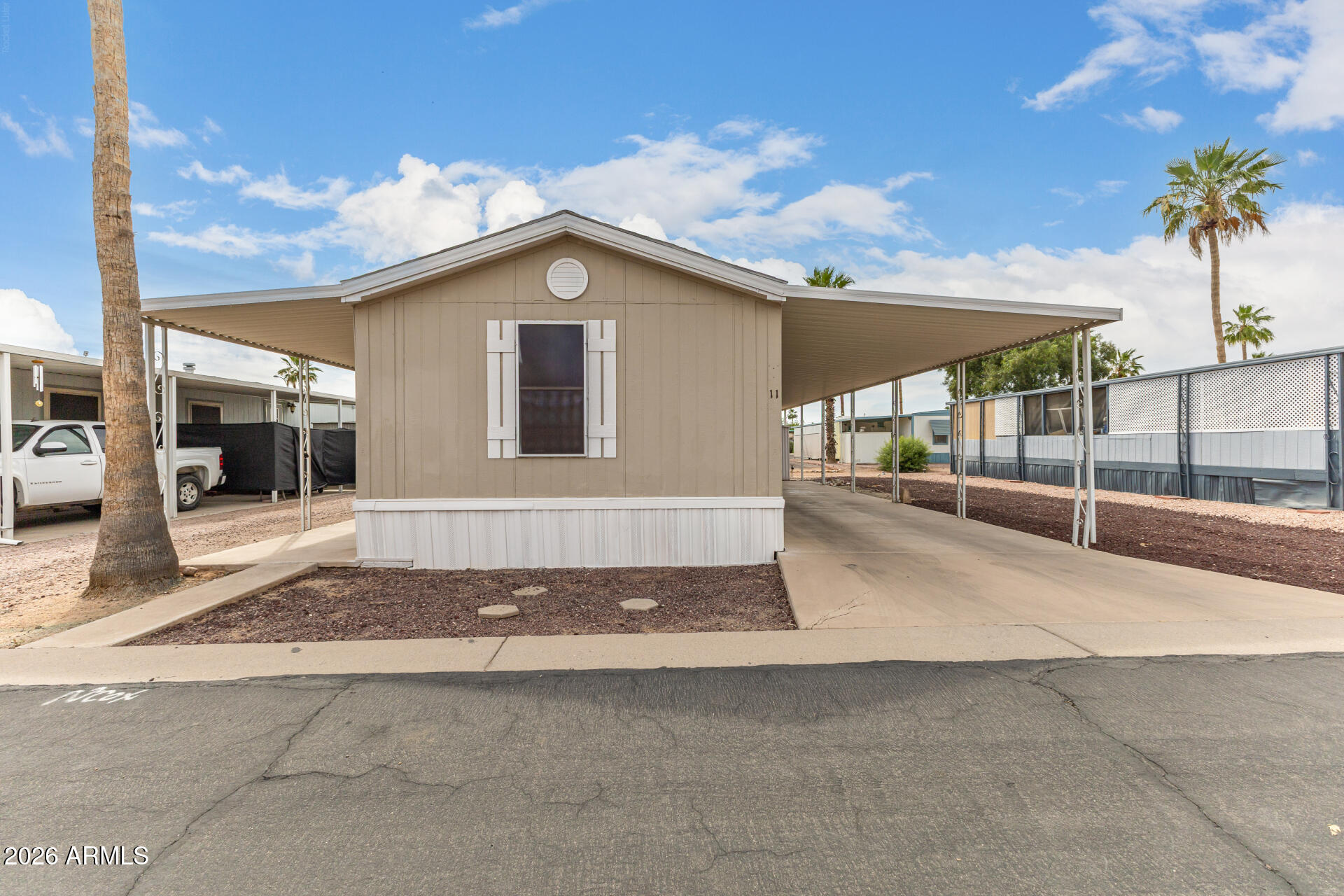 Discover your perfect retreat with this cozy manufactured home in the active retirement community of Sunny Crest. Spanning 16×60 square feet, this charming residence offers 3 bedrooms and 2 bathrooms, making it ideal for comfortable living. The home features a convenient carport, central AC to keep you cool during warm months, walk-in shower for easy access, and modern appliances that add to the home's appeal. The Sunny Crest community offers great amenities, including a swimming pool, clubhouse, spa, shuffleboard court, billiard room, library, and laundry facilities, providing everything you need for a vibrant and enjoyable retirement lifestyle.