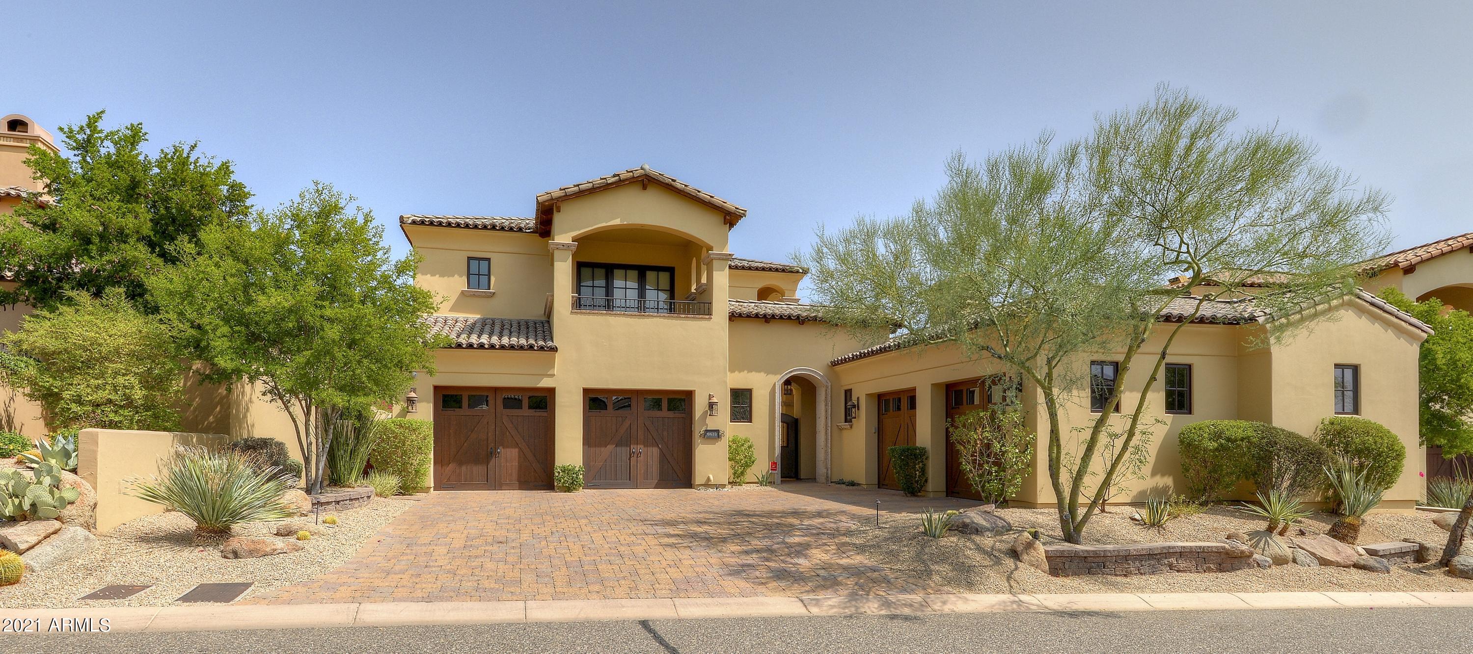One of the best lots, and arguably one of the most highly upgraded homes, in the guard gated community of Paradise Reserve. Built by Cullum Homes with an incredible eye towards quality and detail. Upgrades and features are too many to list (please see upgrade list in documents tab). 4,460sqft main house with master bedroom down and two ensuite bedrooms with view balconies up. Detached 443sqft casita with kitchenette. Two, 2 car garages, one with minisplit and one with charging receptacle. A true custom home from a well know master builder that has been upgraded with the finest in materials, mechanical and electronics. Outstanding outdoor spaces, heated pool and spa, courtyards, Chef's BBQ, water/fire features and Camelback Mountain Views. Perfect year round residence or lock and leave.