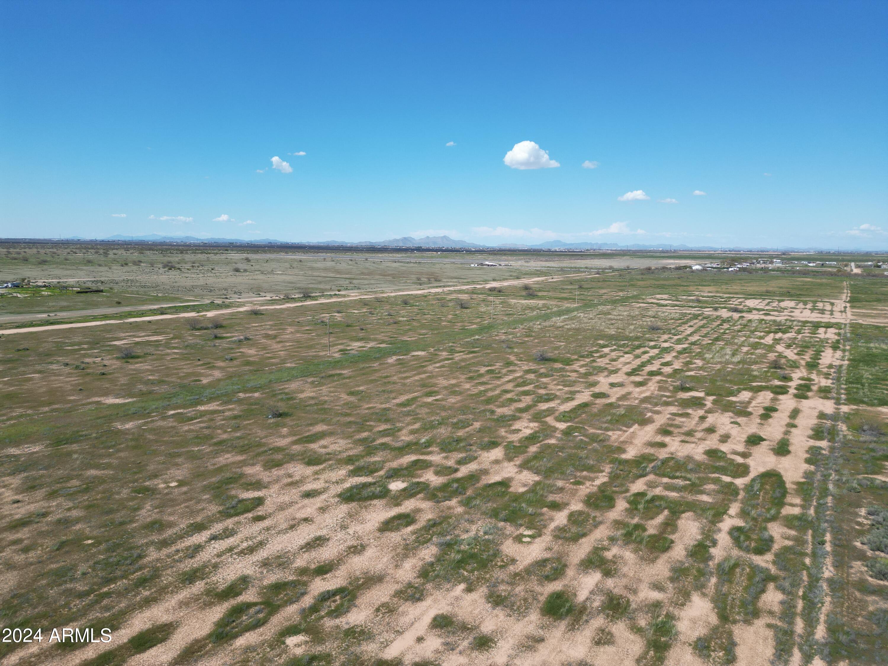 COMMENCING AT THE SOUTH QUARTER CORNER OF SECTION - Land
