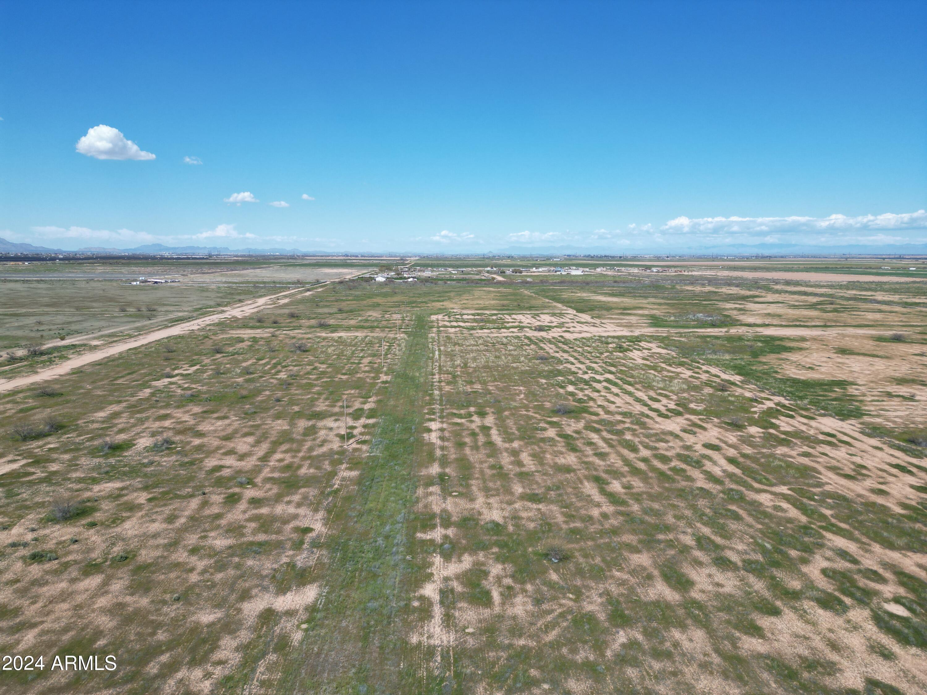COMMENCING AT THE SOUTH QUARTER CORNER OF SECTION - Land