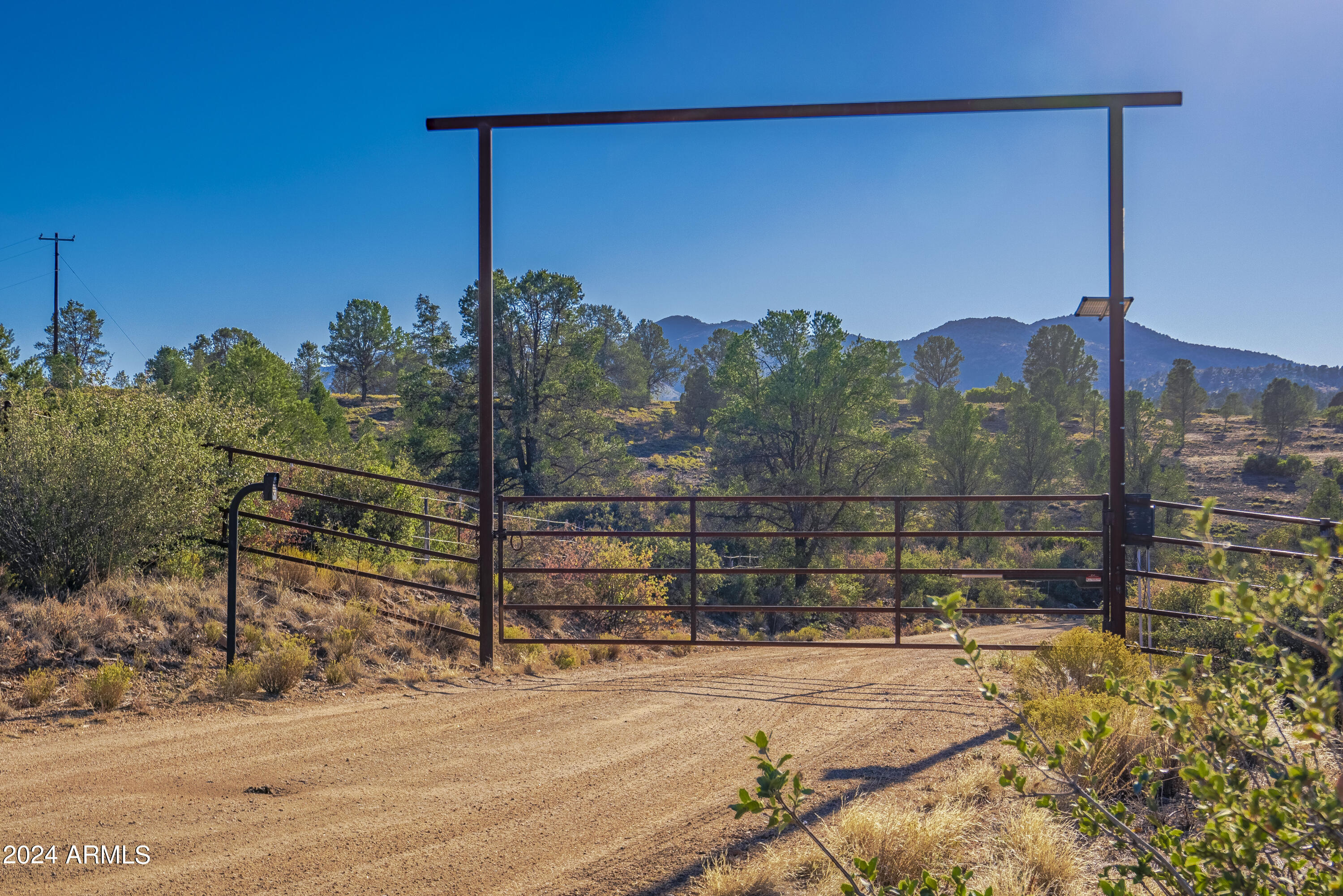 6.98 acres for sale! Escape to the serenity of Peeples Valley. Private gate at entrance. Horse property with stunning panoramic views of the Weaver and Bradshaw mountains. Enjoy mild temperatures and clear skies. Great opportunities to stargaze. Electrical conduit ran to property. This property provides the ultimate seclusion and privacy you desire. No HOA! CCRs are restricted to site built only. 1650 sq ft minimum. A must see!
