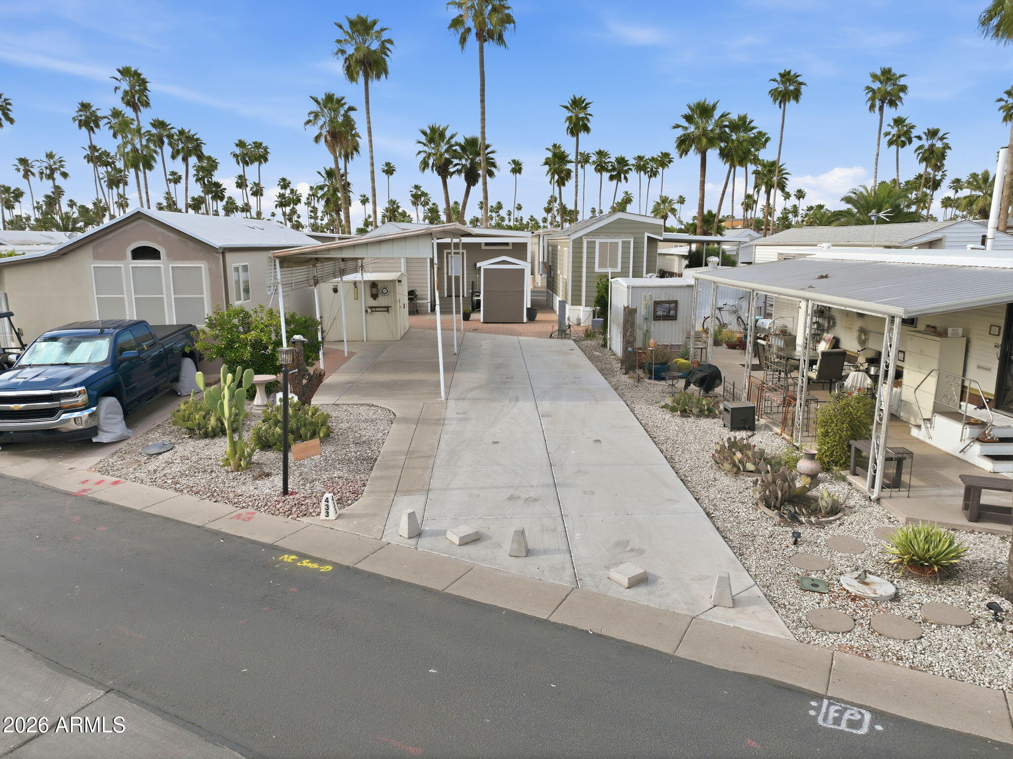 Enjoy your new lot in Venture Out in Mesa! Own your land and park your RV with all hookups ready to go. Awning structure and shed with laundry are also on the lot already. This is the 55+ lifestyle you are looking for! A guarded entry and amenities galore to enjoy your active retirement days. Enjoy the pools, tennis courts, pickle ball courts, shuffle board and endless activities to fill your social calendar. You are even able to install a park model on your new lot so the possibilities are endless!