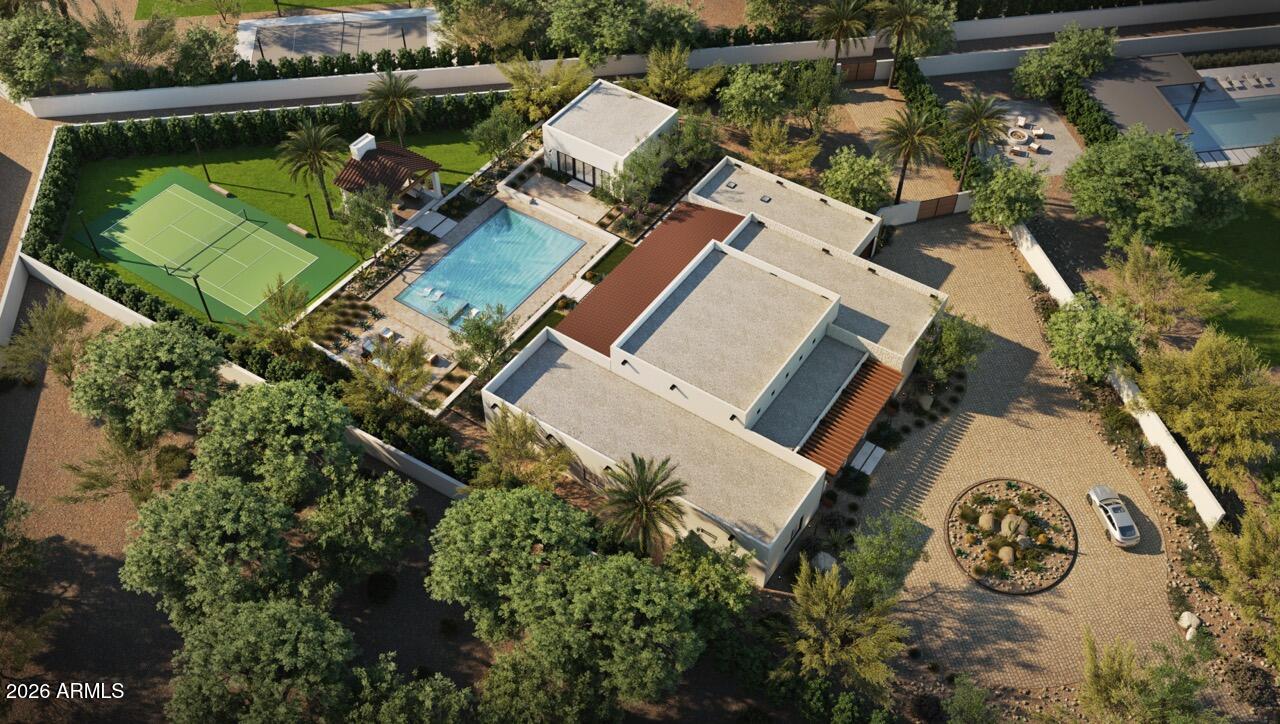 BACK ON MARKET and appraised at $5.1M, this is a rare opportunity to secure an exceptional value in Scottsdale's coveted Cactus Corridor. Set on more than an acre and just 6-8 weeks from completion, this stunning Spanish inspired estate features a 5,300SF main residence complemented by an 841SF detached casita, offering the perfect blend of luxury, flexibility, and privacy.

Designed by Osuna Design and built by Smart Choice Construction, the property offers seven bedrooms and a versatile floor plan with space for a media room, fitness studio, golf simulator, or additional flex spaces tailored to your lifestyle.

At the heart of the home, the expansive great room showcases soaring 16 foot ceilings, exposed wood beams, and a striking fireplace that creates a warm yet sophisticated atmosphere. Open living spaces flow seamlessly into the kitchen and dining areas, delivering a layout designed for both everyday living and effortless entertaining.

Step outside to a backyard designed for entertaining and relaxation. Enjoy a covered patio, ramada, resort style pool and spa, and private sport court, all set within a sprawling acre plus homesite. Whether hosting guests or enjoying a quiet evening at home, the outdoor spaces offer the perfect extension of the home's luxury living experience.