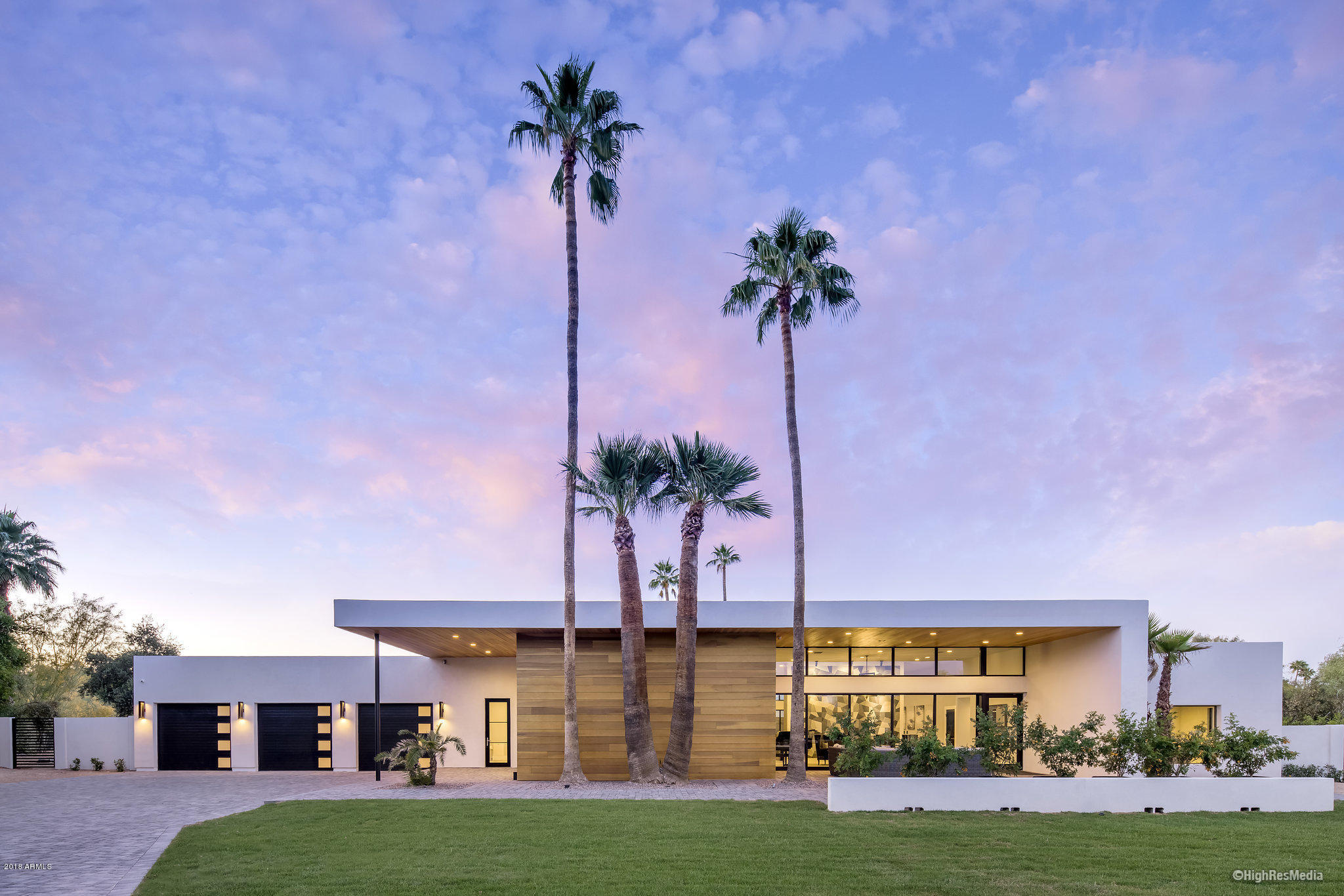 300K PRICE REDUCTION. NOW PRICED TO SELL! Welcome to Modern Luxury at it's best. This newly completed, custom build is located on a 1.56-acre lot at the end of a quiet cul de sac. Enclosed by handcrafted steel fencing and private gates both front and rear, with an eight-camera security system to further enhance privacy and security and a complete audio video package.

Stunning front elevation and pavered entrance lead to the dramatic indoor/outdoor foyer. Beyond the foyer, you're greeted by a gourmet kitchen with extensive butlers pantry as well as enormous, high ceiling great room/dining area featuring a rolled steel fireplace. Distinctive interior finishes by StudioDwell are carried throughout the residence and lend a feeling of casual elegance to the home. The 845 SF  Excercise/Game Room is separated from the beautifully designed media room by a custom fenced dog run covered in turf with an outdoor bathing facility for the extended family. In addition to the detached casita, there is a large guest suite with full bath in the main house. There is also a private massage room and a mud room off the four-car garage.

Just off Scottsdale Rd, the location is one of the best in town. A stone's throw from Scottsdale Fashion Square and Old Town, convenient to the 101, and easy access to the Scottsdale Canal for walking or biking from home to Old Town and Arcadia. The property also features two stalls and a wash rack for horses.
