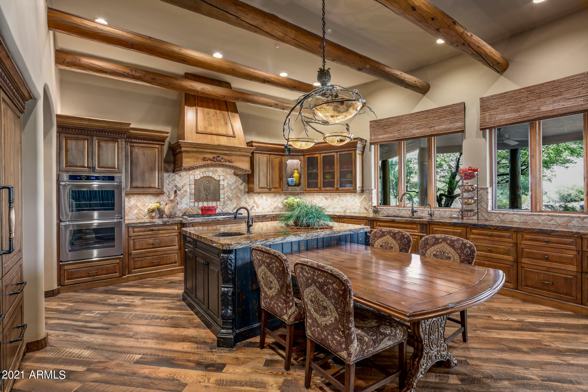 Tucked away in one of the best villages in Desert Mountain, this stunning home sits at the end of a cul-de-sac on one of the finest lots in the community. Overlooking 
Cochise #1-enjoy golf course with mountain views-privacy galore. Lux living featuring a top of the line/no detail overlooked gourmet kitchen and family room, beautiful guest suite/office/studio, living room with knock out views, dining room, exec office, and incredible master suite with dual master baths EACH including private sitting rooms and walk in closets. Separate guest house features living room and kitchenette, large bedroom and bath. Outdoor living can't be beat-deep covered patio with gas fireplace, marvelous views, pool, spa, built-in BBQ. Huge 3 car garage. Minutes from the Desert Mtn gate and Sonoran Club.