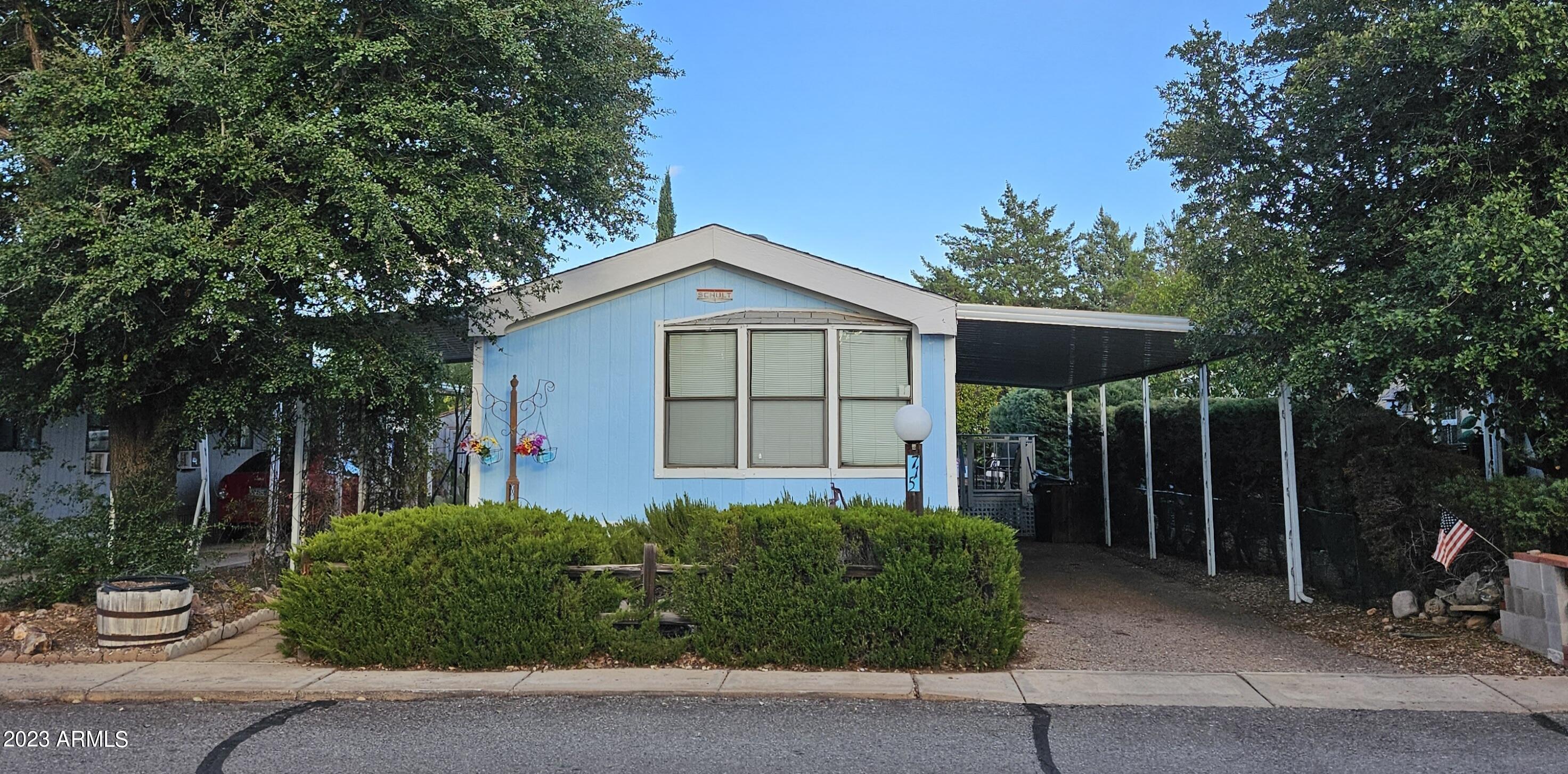 Nice and comfortable 2 bedroom, 2 bath home. Split floor plan with a bedroom on each side of the home. Large open living room, dining room and kitchen. Two sheds included. Gated community with two club houses, 2 pools (one indoor) and spa. This home is conveniently located close to the pools and clubhouses.