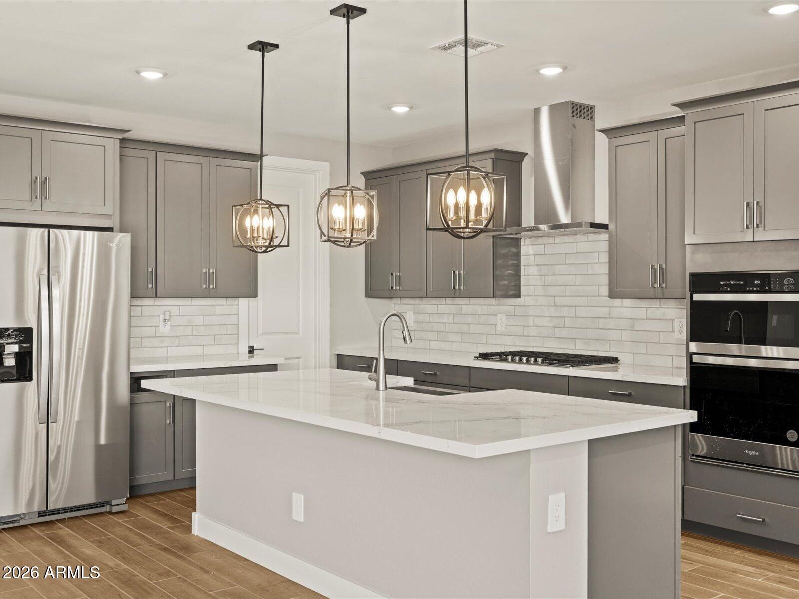 A spacious and unique Single-Story Home! The Lark floorplan offers 4 bedrooms, 3 bathrooms, PLUS a versatile flex space. As a bonus, Bedroom 4 includes its own private bath and walk-in closet. With plenty of space and smart design, the Lark is perfect for modern living and entertaining. This home offers a Spa Shower in primary bathroom, GOURMET kitchen with a cooktop and separate wall oven, dark grey-color cabinets, quartz kitchen counter, tile backsplash, wood-like tile floor, carpet in bedrooms! INCLUDED-washer, dryer, window blinds, refrigerator and more, plus they can be closing-ready in 60 days or less - guaranteed. Master Plan Community amenities! Built with innovative, energy-efficient features designed to help you enjoy more SAVINGS, better health, real comfort, and peace of mind.