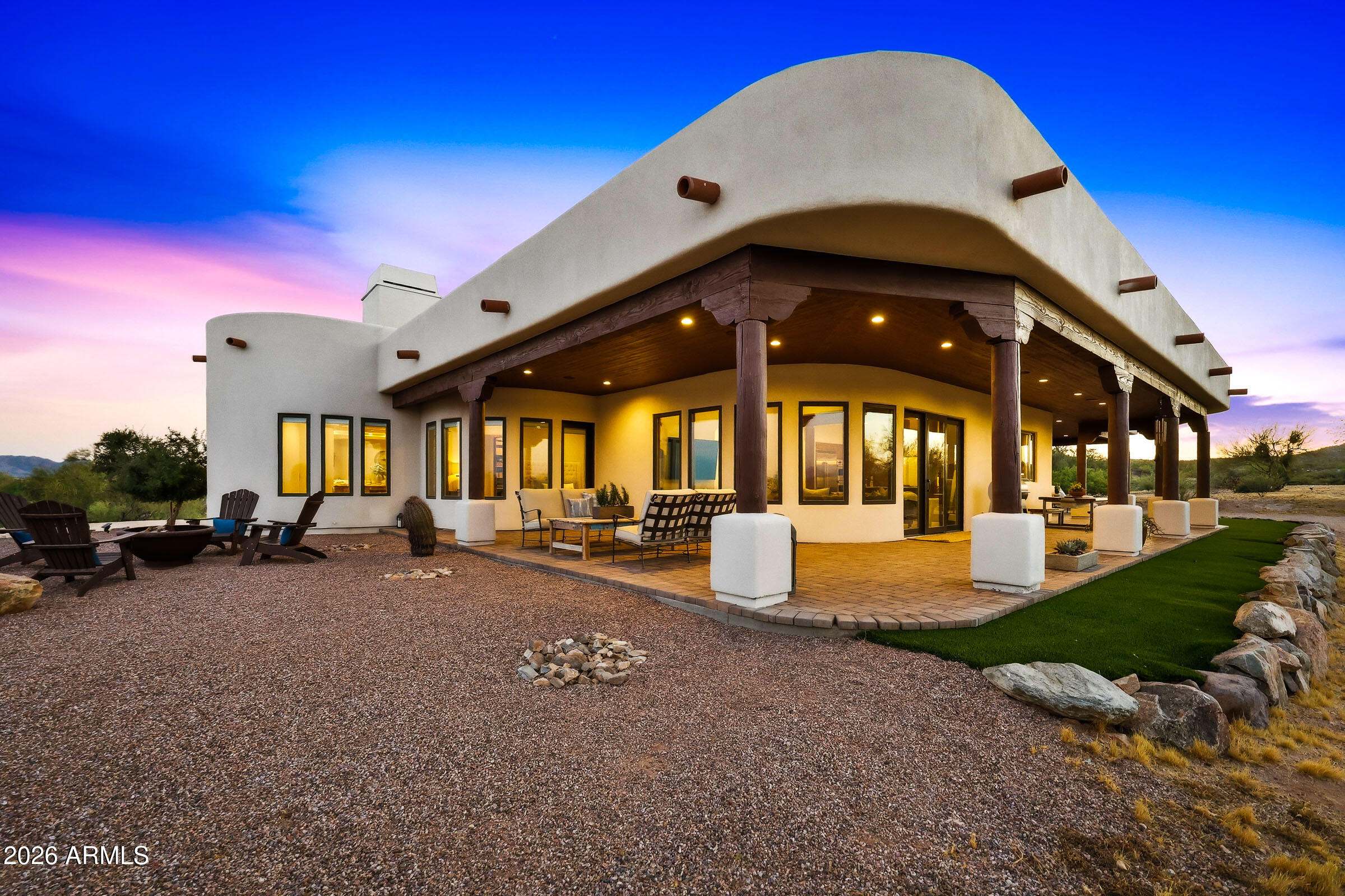 Nestled on a sprawling 1.66-acre lot in North Scottsdale, this exceptional custom residence captures breathtaking mountain and desert vistas while offering the privacy today's buyers desire. Boasting approximately 3,900 square feet of thoughtfully designed living space, the home features 4 bedrooms, 4 bathrooms, seamlessly blending comfort, elegance, and functionality. 
An open-concept floor plan creates an inviting atmosphere ideal for both everyday living and entertaining. Rich wood-beam ceilings, new picturesque and energy efficient Pella windows, and a stunning stone fireplace infuse the home with warmth, character, and timeless Southwestern charm. Natural light pours throughout the interior, showcasing the surrounding landscape from nearly every vantage point. Other interior features include spray foam insullation, Solid Alder doors and  Kitchen cabinets, new Viking appliances, 48" Thermador Professional gas cooktop, Custom Steam shower and 2 gas fireplaces. 
Outside, this beautiful abode boasts a high flowing shared well and the expansive acreage provides endless opportunities to enjoy Arizona's coveted outdoor lifestyle, whether relaxing in peaceful seclusion, hiking the numerous desert trails, entertaining guests, or simply taking in the spectacular desert sunsets and panoramic views. This is a rare opportunity to own a distinctive desert retreat in one of North Scottsdale's most sought-after locations.