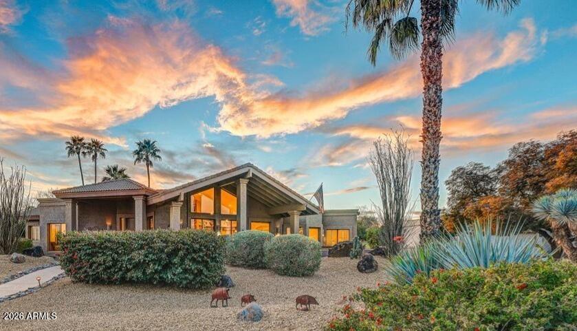 TOP 5 REASONS TO BUY THIS HOME: 1. UNOBSTRUCTED MOUNTAIN VIEWS provide a stunning daily backdrop. 2 PREMIER GOLF COURSE LIVING with fairways bordering both the front and back of the property. 3 PRIVACY All 3 bedrooms are full ensuites. 4. FLEX SPACE is perfect mancave, she-shed, art studio or fitness room. 5. MODERN OPEN CONCEPT provides a seamless great room with wall of windows to include large patio; all designed with gatherings in mind.  6. FULL 3-CAR GARAGE provides plenty of space for storage or workshop area.  BUYER BONUS: Rest easy knowing major maintenance is already handled. The home features a newly refreshed roof system, professional remediation services, all including warranties for the new owner. As we begin cosmetic updates, the seller is offering an opportunity for ... buyers to customize product selections. RIO VERDE IS AN AGE-RESTRICTED COMMUNITY. 80% of residents must have at least one owner 55 years of age or older; leaving plenty of buying opportunity for those who retire early. Rio Verde allows rentals with some restrictions about length of stay. CCR's and Rules provide all details.  The community offers two 18-hole championship golf courses (membership required).  As a community member you may enjoy pickleball, tennis, fitness center, swimming, exercise class, art class, ASU Lectures, community church. AND A WONDERFUL COMMUNITY OF NEIGHBORS!