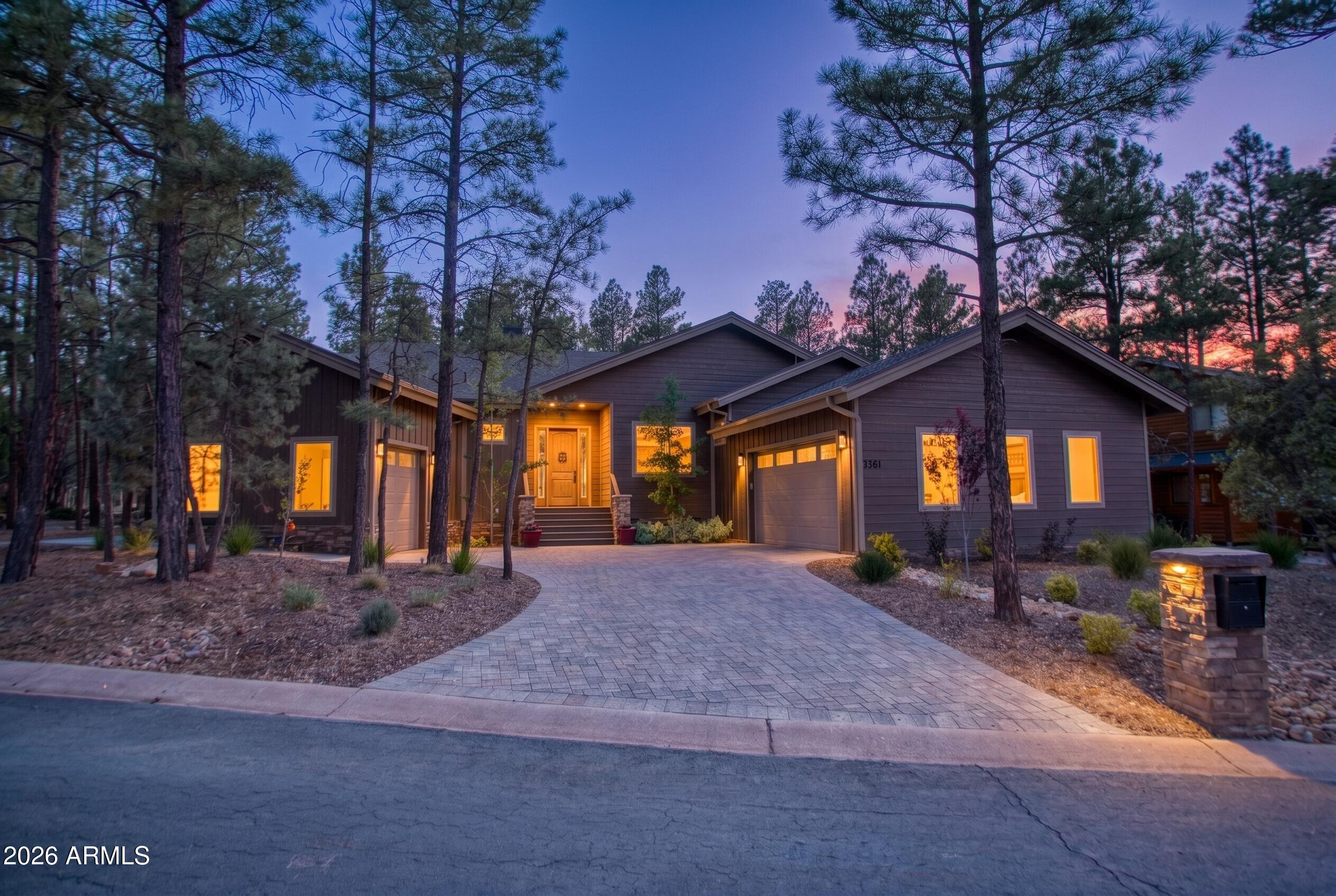 Gated Mountain Modern Custom Home in Torreon Golf & Country Club - Ideal Lock & Leave This wonderful mountain modern custom home is filled with thoughtful luxury touches that will delight even the pickiest homeowner. From the moment you enter through the custom stone floor foyer, you'll notice the impeccable attention to detail designed to please the eye. Inside, the open floor plan is enhanced by stunning tongue-and-groove vaulted ceilings that create a bright, spacious feel. Enjoy solid surface countertops, an expansive marble fireplace, 8-foot doors, and beautiful custom cabinetry throughout. The thoughtfully designed layout offers privacy with a second ensuite guest bedroom on the opposite side of the home. Retreat to the spacious primary suite featuring a large soaking tub, separate shower, and a fully customized closet with ample storage and organization.
Step outside to the oversized rear deck, perfectly nestled among tall pines for ultimate relaxation and entertaining. The low-maintenance landscaping requires little to no effort, making this an effortless lock-and-leave home. The extra-deep two-car garage includes a separate half-garage ideal for your golf cart and off-road vehicle.
Located in the prestigious gated community of Torreon Golf & Country Club in Show Low, this home offers an exceptional White Mountains lifestyle. Enjoy 36 holes of championship golf, a recreational center, fitness facility, pool, and spa right in the community. Just minutes away discover world-class skiing at Sunrise Park Resort, excellent fishing on pristine lakes, and hundreds of miles of scenic hiking trails. The area's famously cool summer weather makes outdoor living comfortable and enjoyable year-round.
The property will be sold as seen, with a short list of exclusions provided. Come, enjoy, and stay.
Seller is a licensed Agent.