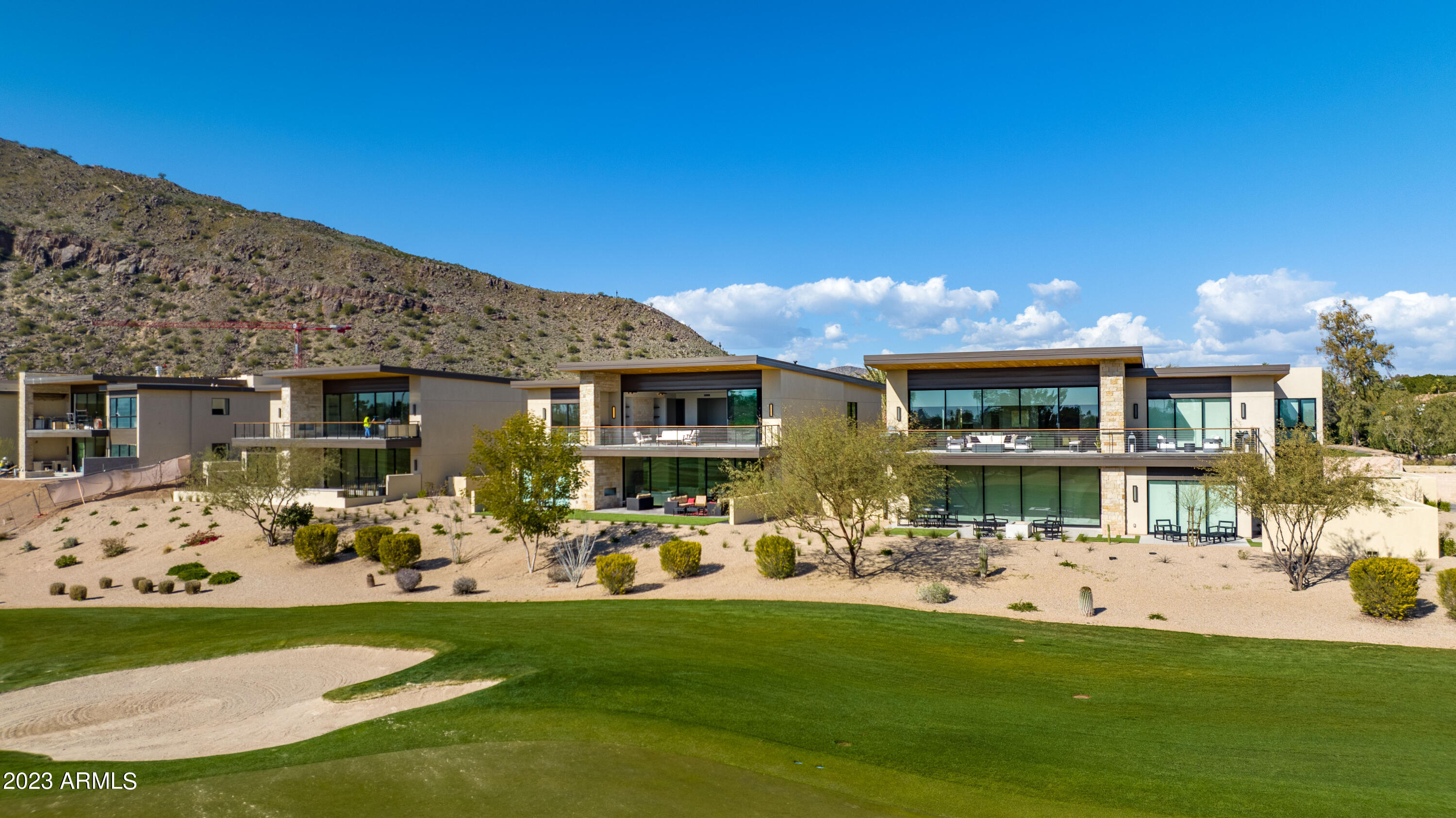 Experience luxury living at its finest in this stunning brand new, completed, golf villa at the Phoenician Resort! Located on the second floor and accessible via elevator, this spacious villa boasts 3 large en-suite bedrooms, each providing ample space for relaxation and privacy.

The grand master bedroom offers breathtaking views of Camelback Mountain and an expansive patio, where you can enjoy your morning coffee or evening drinks while soaking in the beauty of the Arizona landscape. The second bedroom is a junior suite with its own large patio overlooking the first fairway, where you can sit back and take in the magnificent views.

The living room is spacious with high ceilings and features a 60-foot glass sliding door that opens onto a deck overlooking the first fairway. This expansive space is perfect for entertaining guests, hosting family gatherings or simply relaxing in the comfort of your own home.

Constructed with the finest materials, this villa is of the highest quality and offers modern amenities for a comfortable and elegant lifestyle. You will appreciate the meticulous attention to detail that went into designing and constructing this property.

Don't miss the opportunity to own this exquisite golf villa at the Phoenician Resort. This unit has never been lived in and is ready for sale. Start living the life of your dreams today.