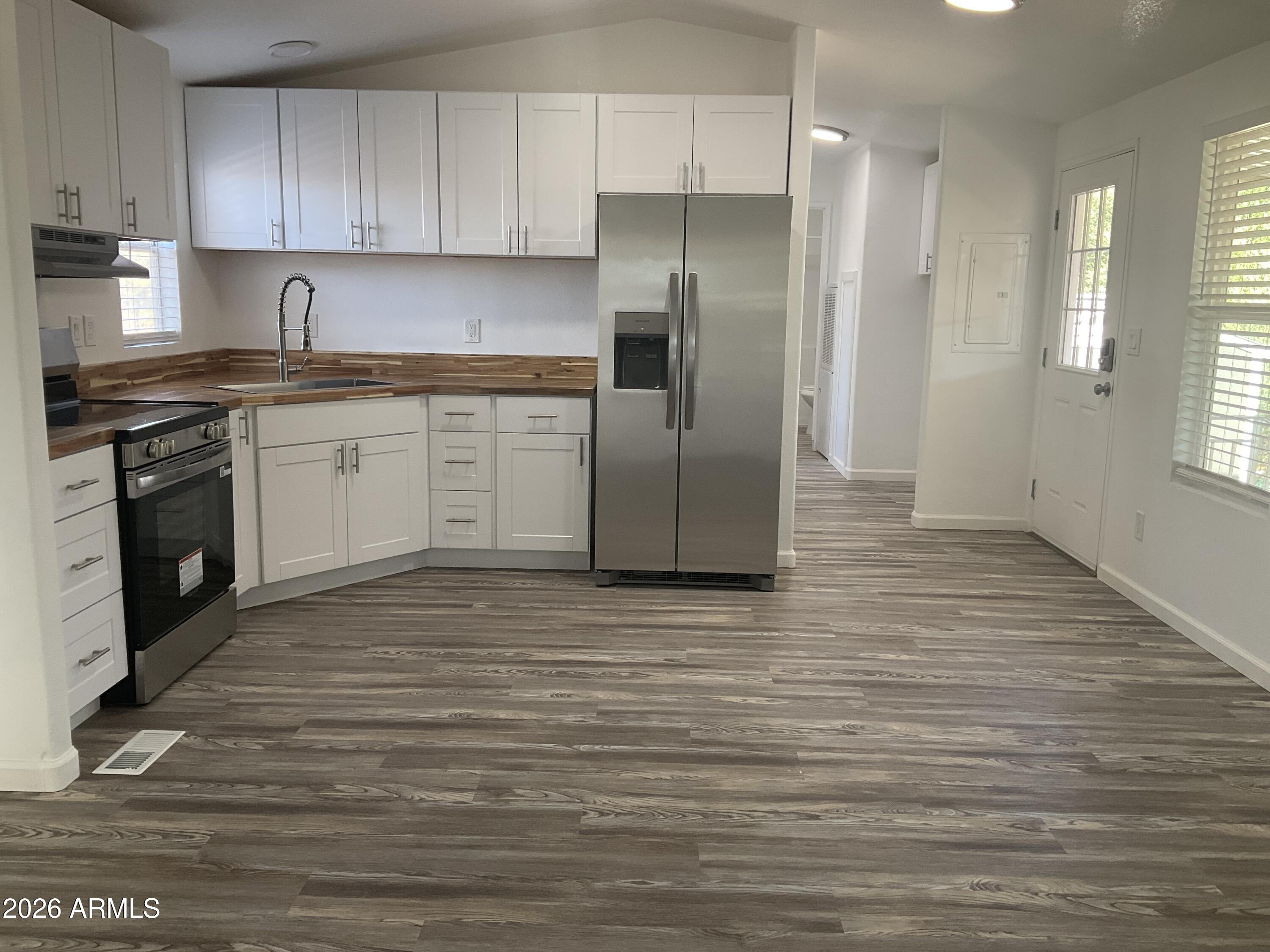 Adorable and move in ready three bedroom home, in the all ages community of Windsong! Enjoy hard floors throuoghout, and ample natural light! This community is located nearby beautiful mountain hiking trails! Cool off in the hot summer months, by taking a dip in the community pool! Welcome home!