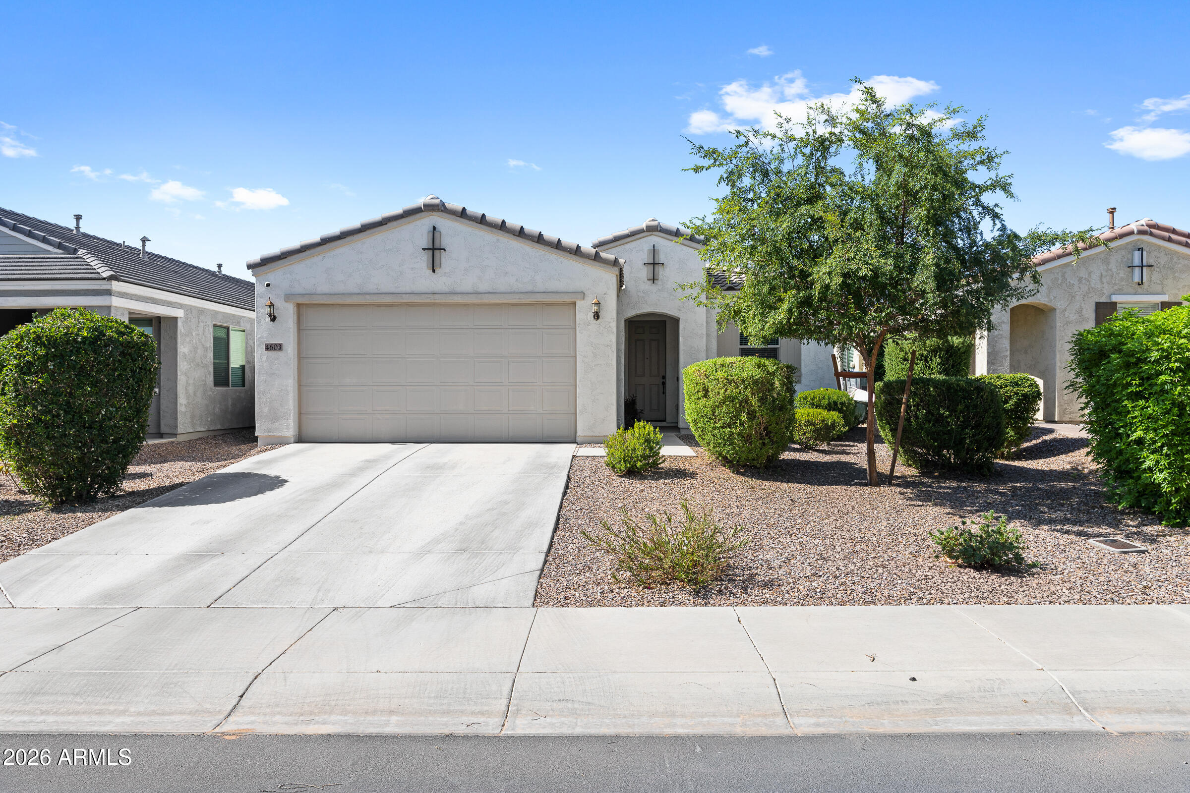 Stunning 2020-built home nestled in the heart of Queen Creek! This spacious 4-bedroom, 2-bathroom, 1,754 sq ft home features an open and airy layout perfect for families and entertainers alike. The 2-car garage adds everyday convenience, while the beautifully landscaped backyard with lush artificial turf is ideal for year-round outdoor living. Best of all, enjoy breathtaking mountain views right from your own private retreat. Modern construction means everything is fresh, clean, and truly move-in ready. Located just minutes from Queen Creek's top dining, shopping, parks, and with easy freeway access to the greater Phoenix Valley -- this one has it all. Don't miss it!