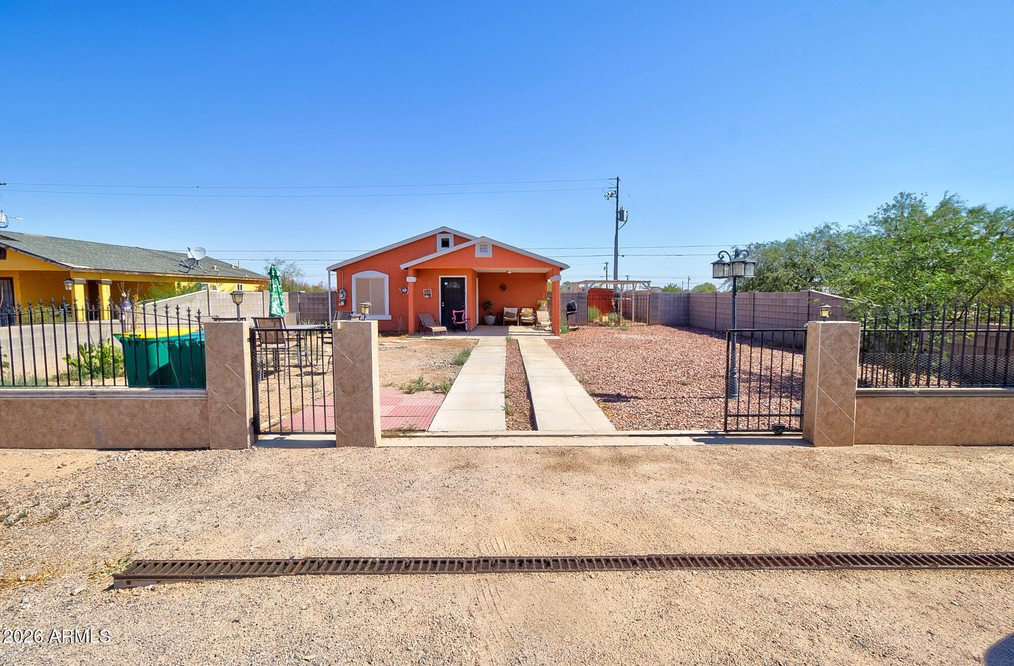 Affordable and move-in ready! This charming 3-bedroom, 2-bath home, built in 2006, is priced at under $200,000--an excellent opportunity for first-time buyers, downsizers, or investors. The home includes all appliances for added convenience and features fully fenced front and back yards, offering privacy and space for pets, kids, or entertaining. Covered parking includes a one-car carport plus a separate awning for additional vehicles. Don't miss this budget-friendly home with great value! Assumable loan, ask for details!
