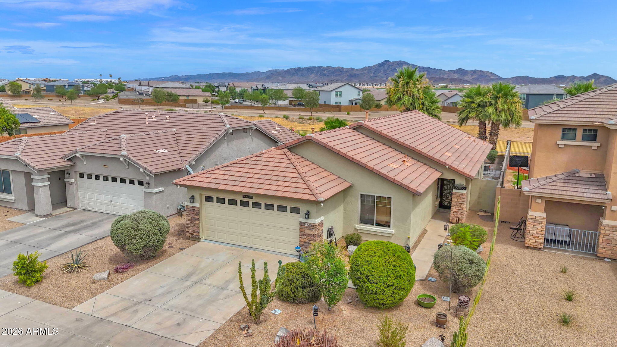Incredibly well maintained, thoughtfully upgraded, and truly move-in ready, this home offers the perfect blend of comfort, style & Arizona living. Enjoy mountain views from your private backyard, with ample space to entertain family & friends or simply relax & take in the serene desert surroundings. Open space behind the property provides walking paths and picturesque views that only the Arizona desert can offer. Inside, you'll find granite countertops, stainless steel appliances, stylish fixtures and finishes & a desirable open-concept floor plan designed for both everyday living & entertaining. Conveniently located near shopping, dining, and freeway access, this home offers an easy commute throughout the Valley while still providing a peaceful retreat to enjoy year round.