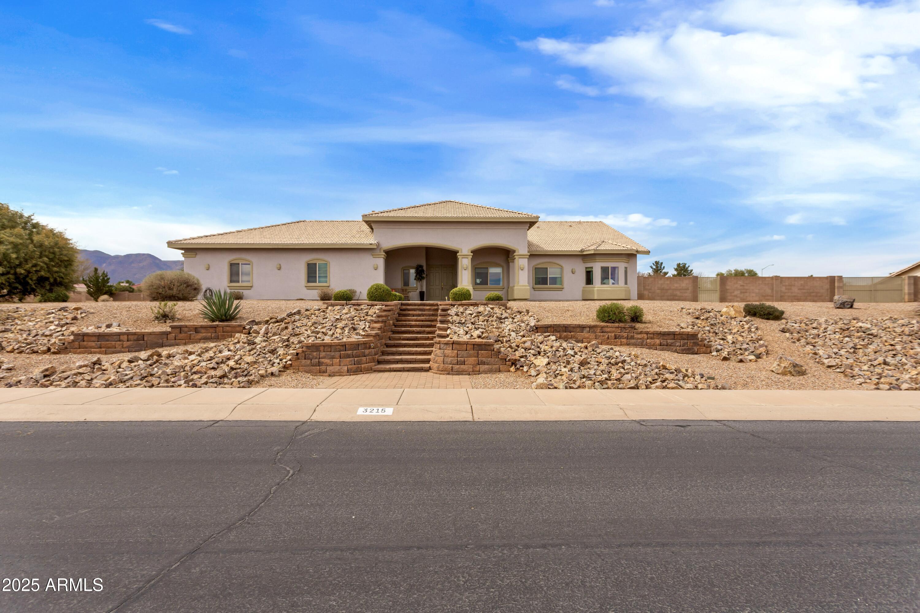 Stunning custom built home featuring over 3000 square feet, 4 bedrooms (each with their own walk in closet), 2.5 bathrooms, oversized 3 car garage on a corner lot with BIG mountain views!  This stunning home has everything you are looking for!  Interior features include 10ft ceilings, solar tubes throughout home,  granite countertops, stainless steel appliances, kitchen island, breakfast bar, large dining area, spacious pantry, living room & family room, laundry room with 2 washers & 2 dryers (appliances convey), loads of storage space in garage, water softener, and recently upgraded windows!  This large parcel, over .8+ acre, features wonderful landscaping, covered & uncovered patio areas, and RV gates. All with NO HOA!