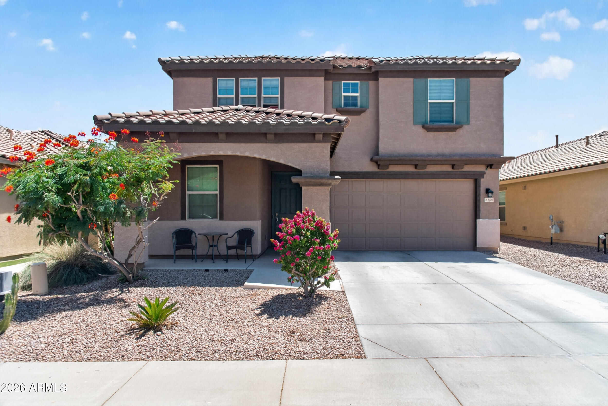 Welcome to your stunning north-facing, two-story retreat with unbeatable views of the San Tan Mountains--right from both the front yard and the backyard. Just five minutes from the trailheads of San Tan Regional Park, this home blends comfort, space, and adventure in one perfect package.

Step through the front door and immediately to your left you'll find a full bathroom and a conveniently located first-floor bedroom--ideal for guests, multigenerational living, or a private office. Continue into the heart of the home and you're greeted by a cozy breakfast nook before the space opens into a massive great room. The oversized granite kitchen island anchors the room beautifully, offering the perfect setup for entertaining, cooking together, or gathering with family.

Just off the great room is an additional flex space--perfect for a game room, bar area, or creative lounge. Upstairs, the spacious master suite awaits, complete with its own private bathroom. You'll also find three more bedrooms, a full third bath, and a loft that can serve as a second living area, playroom, or home office.

Outside, enjoy peaceful mountain views and Arizona sunsets, and when you're ready to cool off, the community pool is just steps away.

Homes with this combination of space, views, price and location don't come around often. Schedule your showing today--this one will not last long.