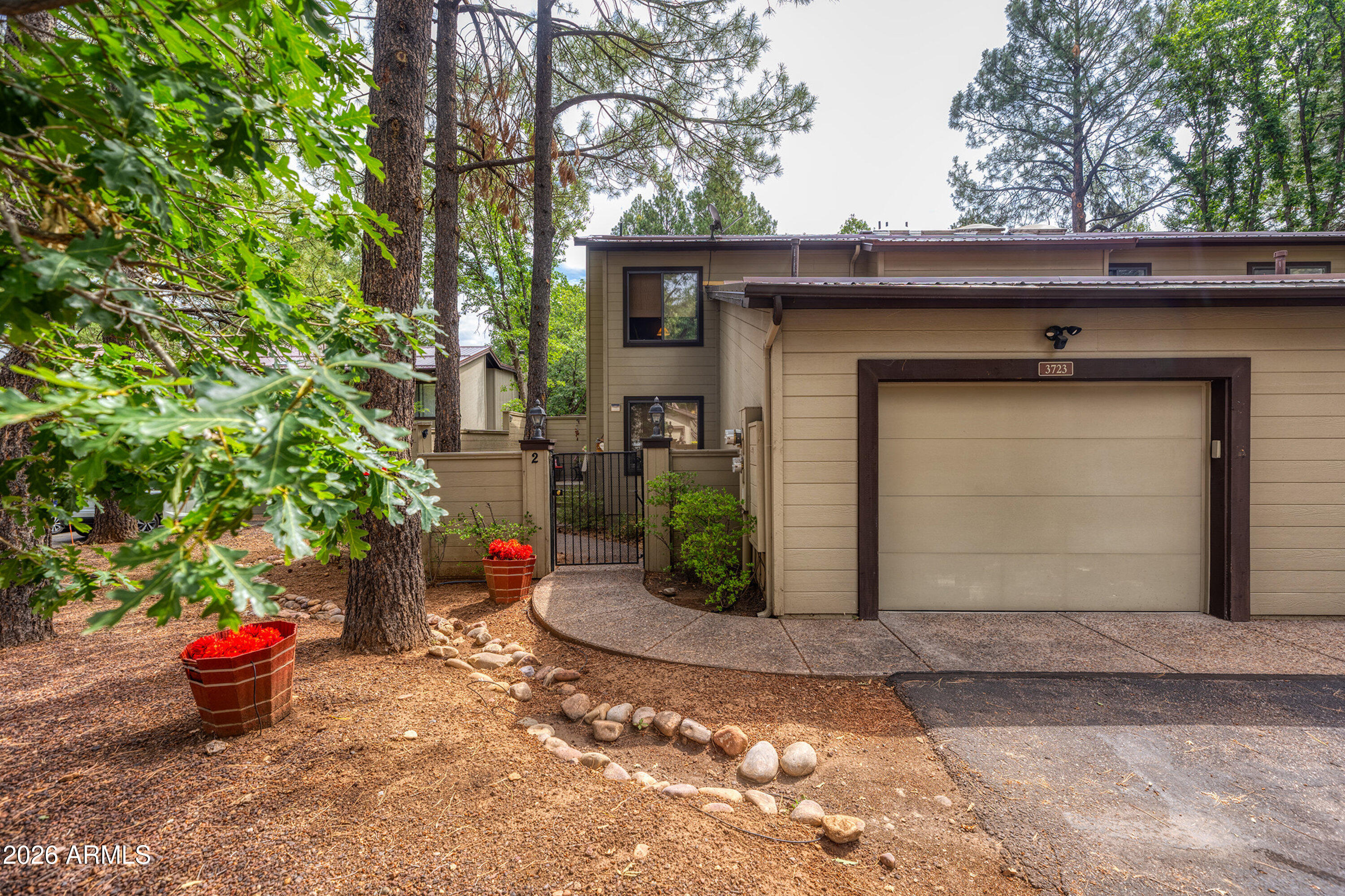 Situated on the 7th tee of Pinetop Lakes Country Club in the desirable Quality Hills community, this beautifully crafted DUAL SUITE townhouse WITH HUGE LOFT combines elegance and convenience in every detail. It features two spacious primary suites with upgraded bathrooms that include a Jacuzzi tub, steam room, and oversized showers. A large loft with a wet bar and refrigerator provides excellent space for relaxing or entertaining, and the generous 650-square-foot deck offers picturesque views of the golf course, perfect for quiet evenings or social gatherings. The kitchen and baths are finished with thick granite countertops and elevated cabinetry, complemented by stone tile flooring and upgraded fixtures throughout. Additional highlights include artistic textured ceilings, LED lighting, a single-car garage with storage, a large laundry room with cabinetry, and ample closet space including a walk-in closet in the upstairs suite. The home is complete with a 52-gallon gas water heater with a recirculating pump and a courtyard side entrance for added charm. Residents enjoy access to beautifully maintained common areas featuring running water, peaceful ponds, and a community clubhouse, making this a true retreat for golf enthusiasts and nature lovers alike.

Features for this property:
*Dual Master Suites with double vanities
*Upgraded Cabinets and thick edged Granite
*52 Gallon Gas WH with re-circulating pump.
*Large Stone Wood Burning Fireplace w/ Gas Starter/Burner
*Large Loft with Wet Bar can easily accommodate a sleeper sofa
*Single car garage with closet
*Beautiful Courtyard Side Entrance
*LED Lighting throughout
*Large Laundry Room w/Cabinets & Washer/Dryer
*Extra Closet space and Large walk-in closet at upstairs master