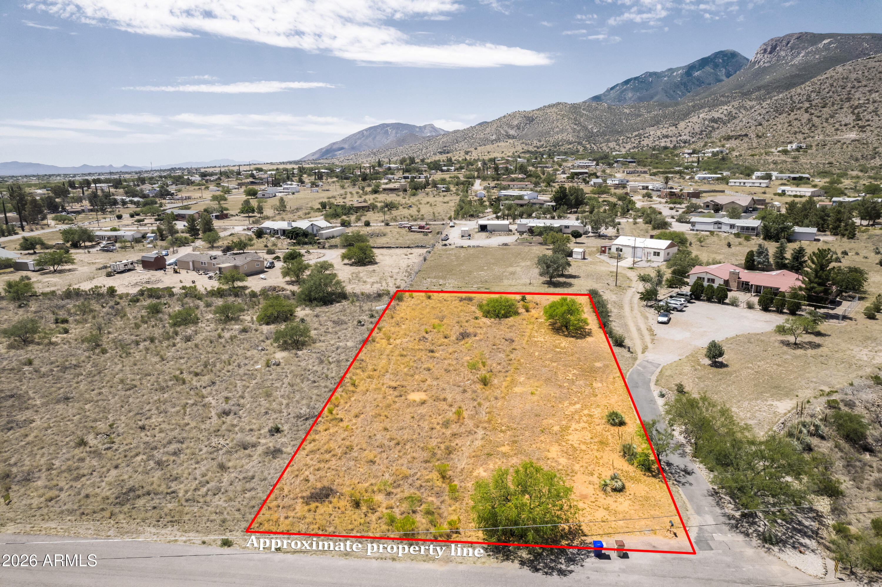 Featuring panoramic views of the Huachuca Mountains and the picturesque Carr Canyon Waterfall, this beautiful parcel offers a peaceful setting and the perfect opportunity to build a custom home designed to fit your lifestyle. This very buildable lot offers water at the property line with electric nearby, making it easy to bring your vision to life.
Wake up to stunning mountain vistas, enjoy abundant wildlife, and relax while taking in Arizona's spectacular sunsets. Experience the serenity of country living while remaining just minutes from shopping, dining, healthcare, and other everyday conveniences. Whether you're ready to build your forever home or looking for a smart investment opportunity, this property offers an exceptional combination of natural beauty and privacy.