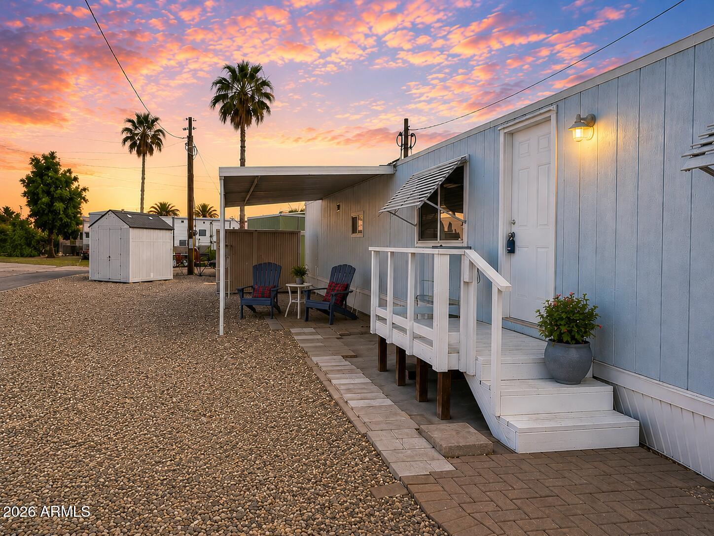 Tucked inside one of Chandler's hidden manufactured home communities, this updated 2-bedroom home may surprise you from the moment you walk through the door. From the newer flooring and freshly painted gray-and-white cabinetry to the updated appliances and newer HVAC/roof, this home offers a more modern feel than many buyers expect in this price range.

The split-bedroom floorplan provides privacy, while the flexible second bedroom and built-in desk area create an ideal setup for working from home, hobbies, or guests. The kitchen features a newer gas stove, dishwasher, garbage disposal, refrigerator, and plenty of cabinet space. Stackable washer and dryer are included too.

Outside your front door, the community offers amenities including a pool, hot tub, clubhouse, social activities, and more -- all in a convenient Chandler location near shopping, restaurants, and freeway access.

Homes with this level of updating, newer major components, and this much charm rarely come along at this price point. Cash buyers only.

Ask your REALTOR® for the full photo package, community details, and everything the seller updated before this opportunity disappears.