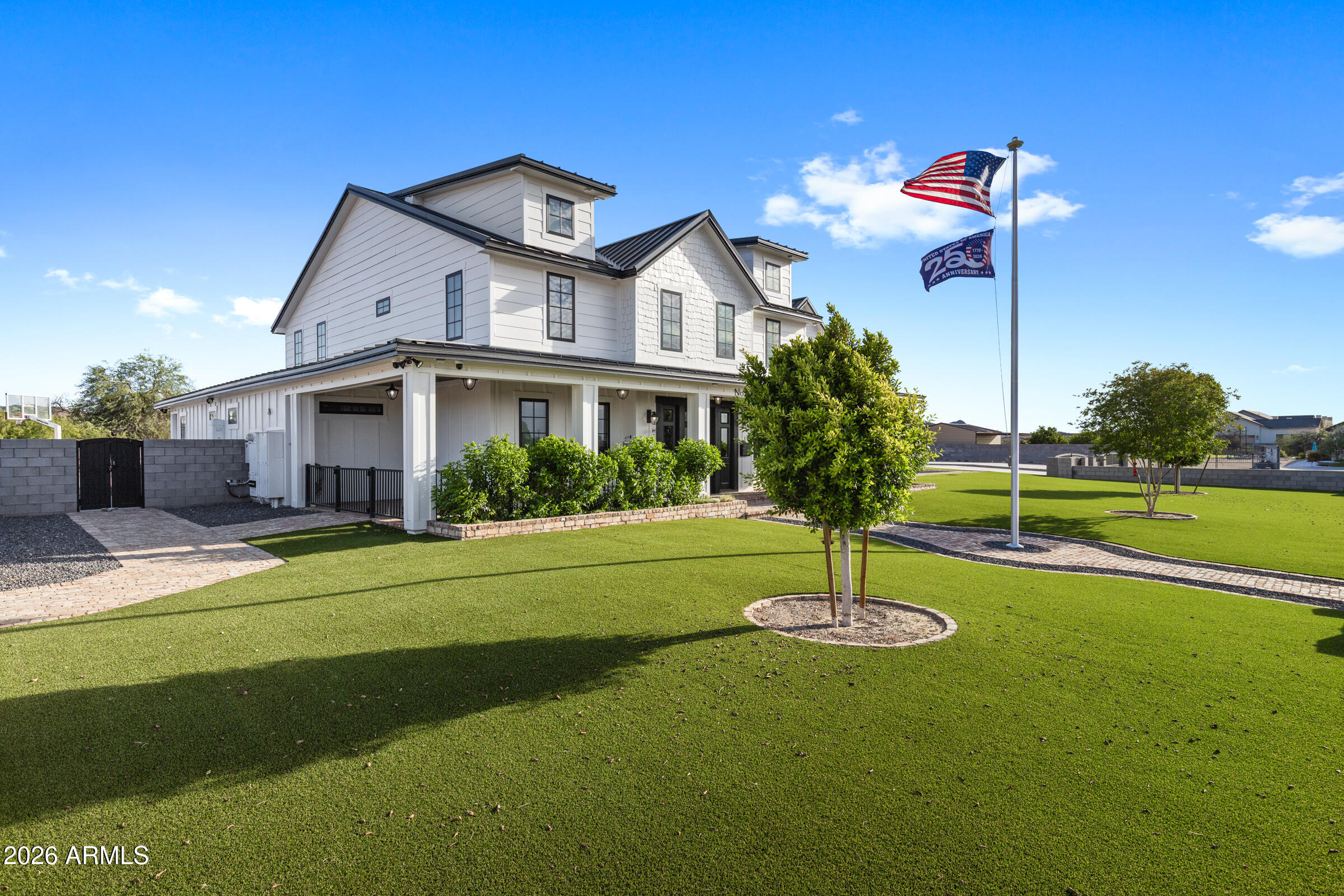 Stunning craftsmanship from Breinholt Development! Two stories of thoughtfully planned premium finishes in this nealy 5000 square foot custom home. Designer entry with tumbled, old world pavers leading up to massive covered porch ready for your rocking chairs! This 2.5 acre lot is full fenced with 8x8x16 walls and custom gates all around. Oversized garages and RV garage are heated and cooled with a basketball hoop inside and closed off with insulated wooden doors. The kitchen boasts Thermador appliances with push-to-open doors in the columns as well as fridge and freezer beverage and snack drawers in the island. Massive farm sinks in both the kitchen as well as the laundry which has double stacked washer/dryer setup! Master shower is a spa entry steam shower with all the bells and whistles that you have got to come see! Rubber floored gym space and game room are perfect for the active families looking for some extra fun space at home. There are too many custom touches in this one to rattle off here, come check it out!