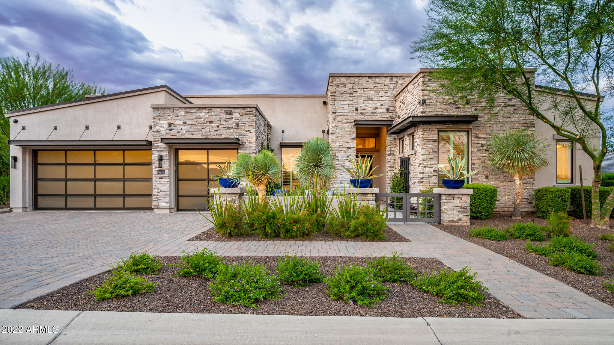 LUXURIOUS ESTATE WITH DESIGNER UPGRADES ''PRIOR TOLL BROTHER'S MODEL'' on 4TH FAIRWAY of TRILOGY VERDE RIVER RESORT COMMUNITY. Enjoy the Arizona lifestyle with a stunning home on half-acre lot; Indoor outdoor living optimized with retractable glass panel doors that open to the spectacular backyard with pool, firepit, impressive kitchen/bar with kegerators, TV, covered patio, bocce ball, mountain views. Well-appointed gourmet kitchen; Owner's suite with spa like bathroom, soaking tub, shower with lighted onyx wall; custom closet; 2nd bedroom suite and guest casita; Spectacular great room, game room with bar; formal dining; office; Control4 home system, speakers throughout, surround sound; 3 car garage. Your opportunity to buy this one-of-a-kind retreat.