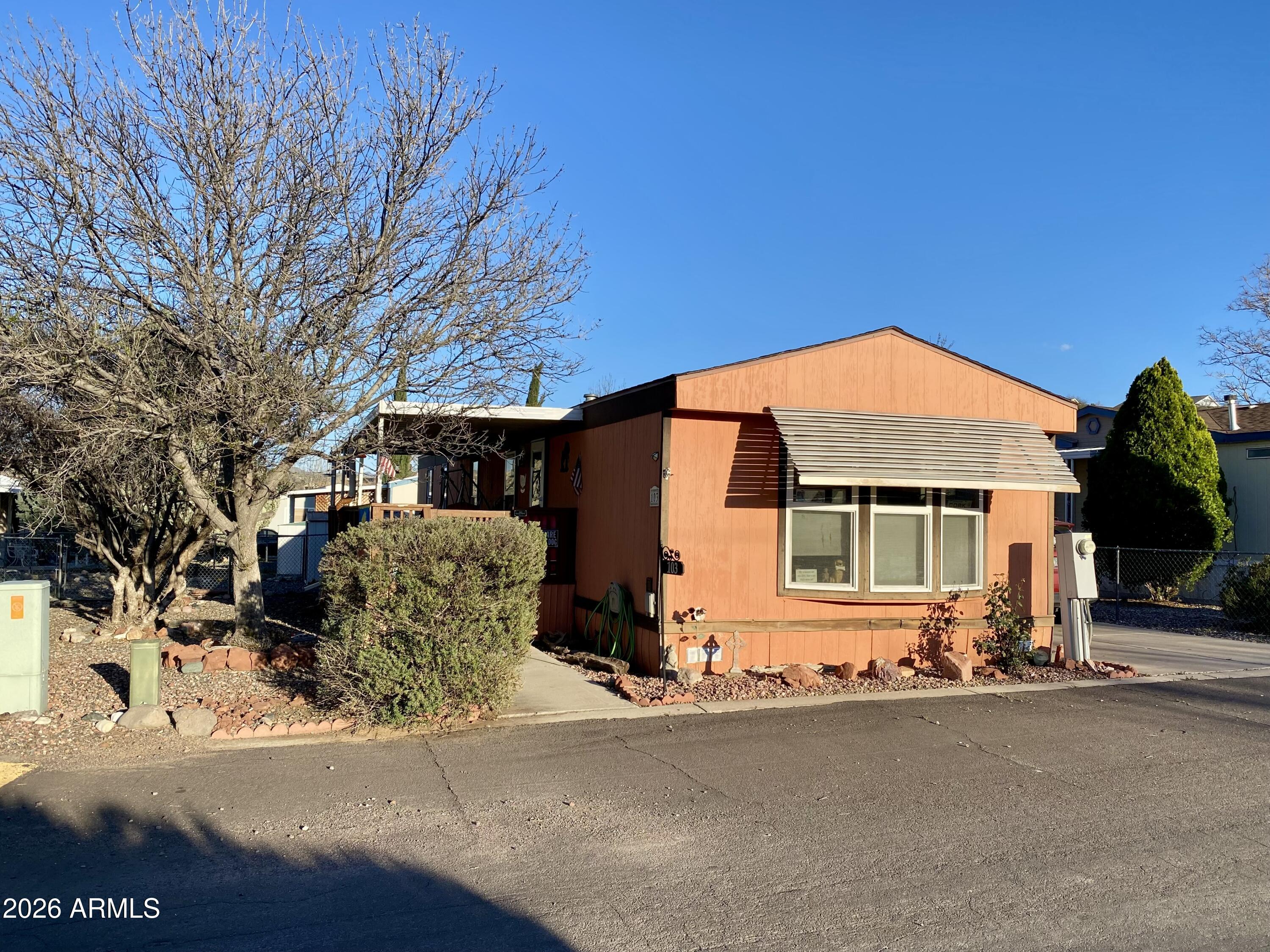 Fantastic Opportunity, priced well, affordable, with many updates to include; flooring, bathrooms and a nice open floor plan with large kitchen island and for the family. 2 additional storage sheds and chainlink fencing off the covered decking provides for a pet safe environment. Centrally located with all conveniences within a short distance from home.