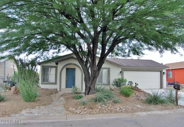 This nicely remodeled 3BR/2BA/2CG, 1107 Sq.ft. home in Huachuca City, AZ is minutes from Ft. Huachuca and Sierra Vista, AZ.   The property sits on a premium lot that backs up to Ft. Huachuca's East Range with beautiful views of the Arizona sunrise.  The home includes s/s appliances, central A/C and has a large 2-car garage with storage closet. The exterior and interior of the home have been freshly painted.   The yards are beautifully landscaped. Call today.