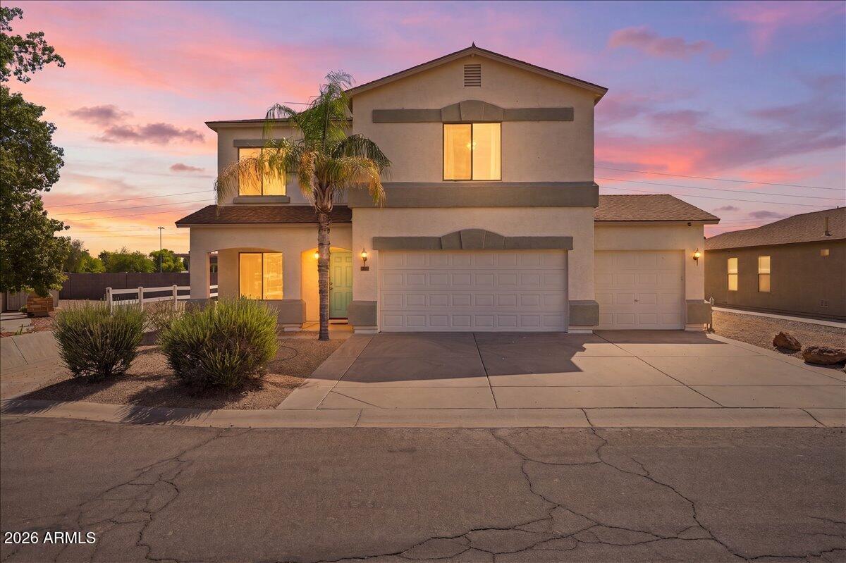 Tucked in the sought-after Johnson Ranch community, this home has everything on the list. The backyard was completely reimagined for entertaining: heated pool, travertine pavers, build in grill & bar, turf, and a putting green, all backing to the golf course for open space and privacy.

Inside you'll find 4 bedrooms, 2.5 baths, and a rare 3-car garage with Tesla charger already installed. New AC units, fresh exterior paint, and a newly upgraded tile shower in the primary bath mean the big updates are already done.

Johnson Ranch amenities include multiple pools, tennis, pickleball, golf, walking paths, greenbelts, and playgrounds all just minutes away. A true move-in ready gem!