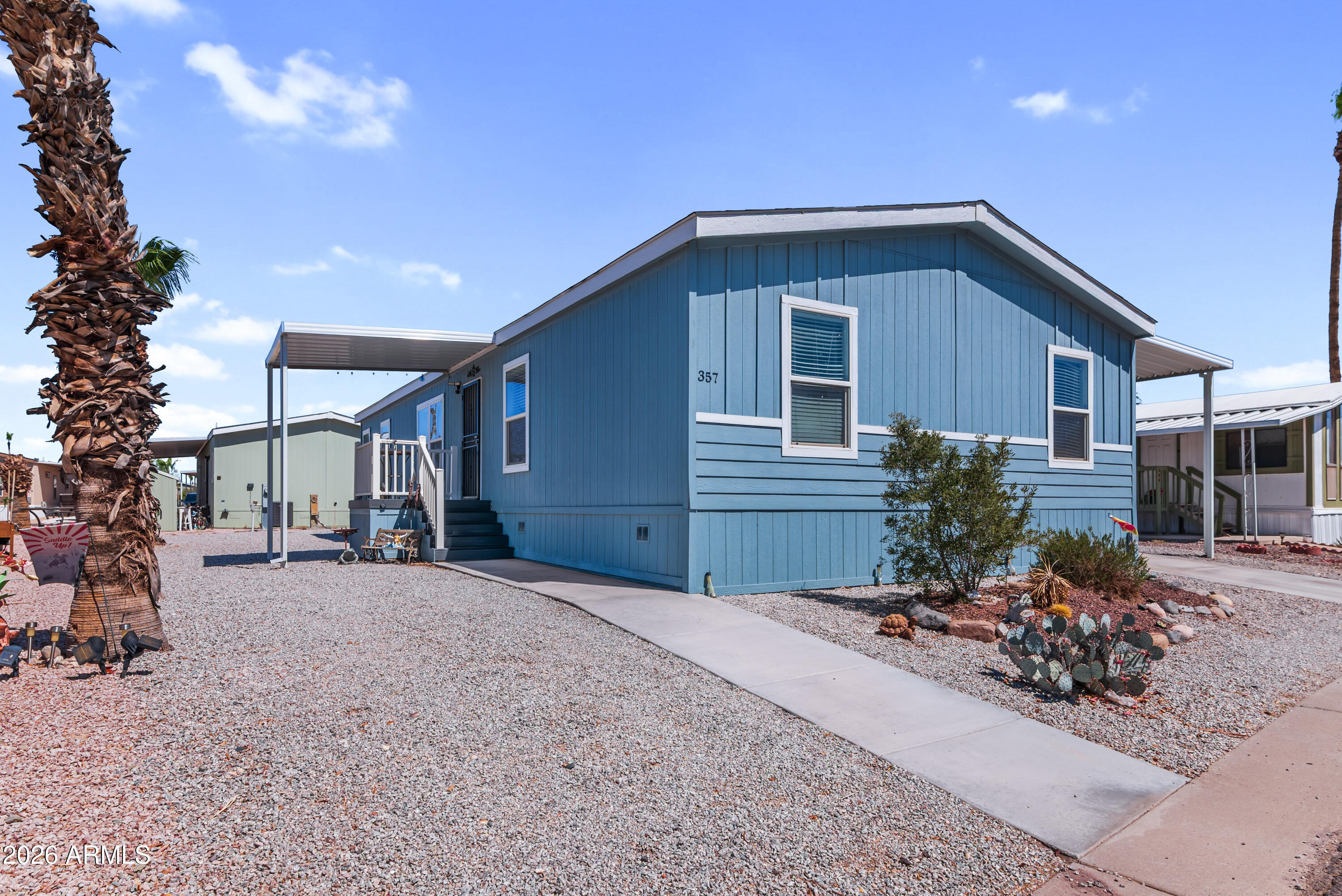 Beautifully maintained 4-bedroom, 2-bath manufactured home offering 1,550 sq. ft. in the desirable Buena Vista Community in Buckeye.  One of the largest homes in the community, this spacious floor plan provides comfortable living with generous living areas and well-sized bedrooms.  This move-in ready home also offers upgraded cabinets and plenty of storage throughout the home.  Enjoy fantastic community amenities, including a sparkling pool, clubhouse, sports courts, playground and more.  Conveniently located near shopping, dining, schools and freeway access, this home offers the perfect combination of space, comfort and community.  Don't miss this incredible opportunity.