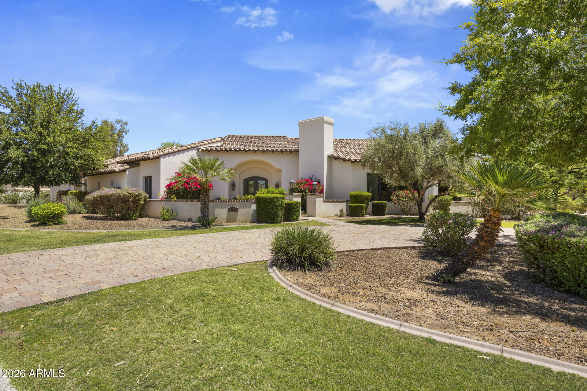 Located in the heart of Paradise Valley, this stunning home offers timeless design, generous living spaces, and the rare added flexibility of a finished basement. Thoughtfully designed for both everyday living and entertaining, the spacious floor plan features inviting gathering spaces, abundant natural light, and seamless indoor-outdoor flow. The well-appointed kitchen opens to the main living areas, while the expansive primary suite offers a private retreat with spa-like amenities. The basement provides versatile additional living space ideal for a media room, game room, fitness area, or guest retreat. Outdoors, enjoy beautifully maintained grounds, privacy, and the best of Arizona living. Ideally located near premier dining, golf, hiking, and shopping.