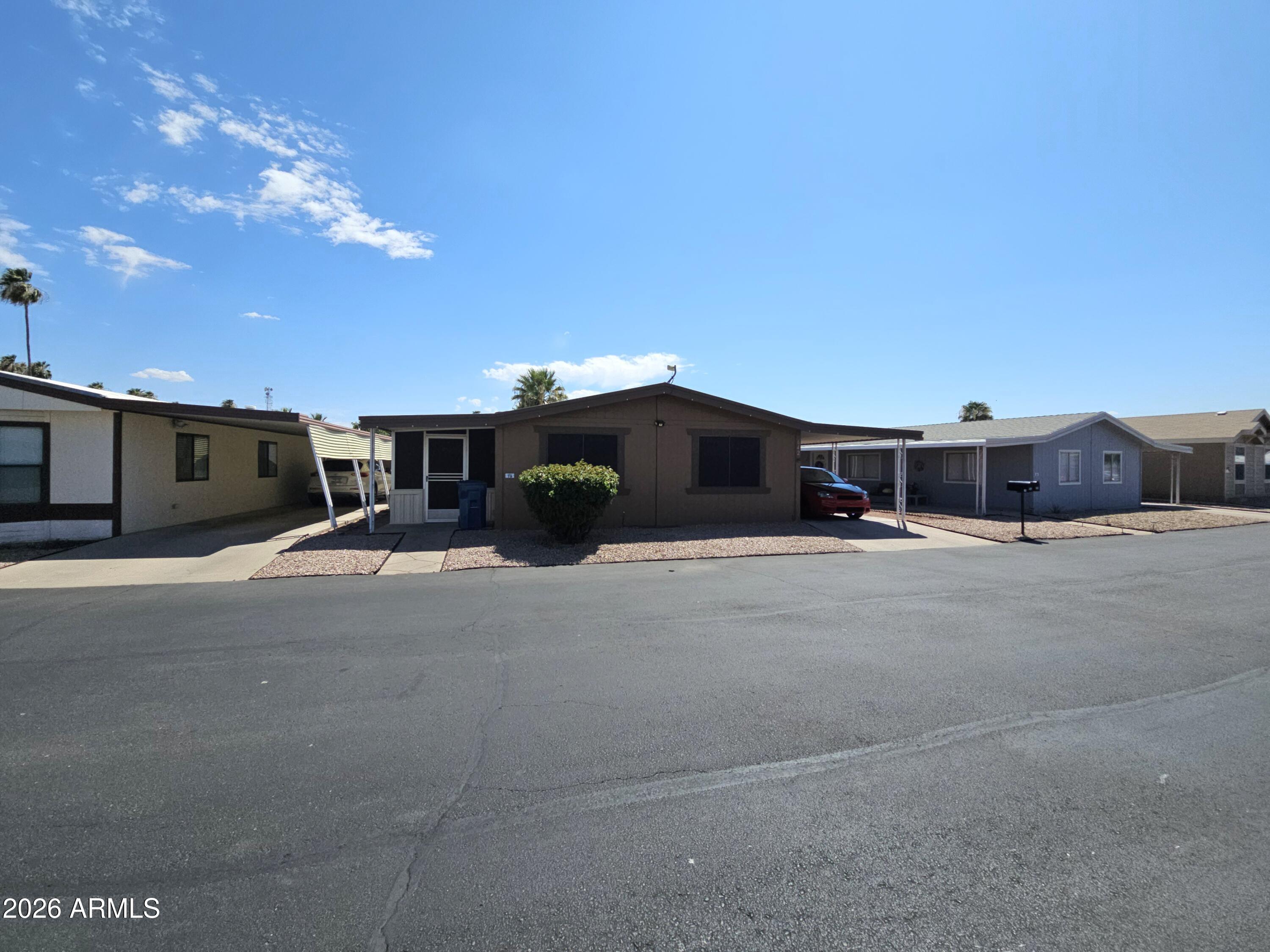 Welcome home to this spacious 3-bedroom, 2-bath manufactured home in the desirable San Estrella community of Phoenix! Featuring a huge Arizona room, this home offers flexible living space perfect for relaxing, entertaining, hobbies, or a home office. Enjoy an open and inviting floor plan with plenty of room to make it your own. San Estrella offers resort-style amenities including a community pool, clubhouse, media room, fitness facilities, and a full calendar of activities. Conveniently located near shopping, dining, and major freeways, this home combines comfort, value, and an active Arizona lifestyle.