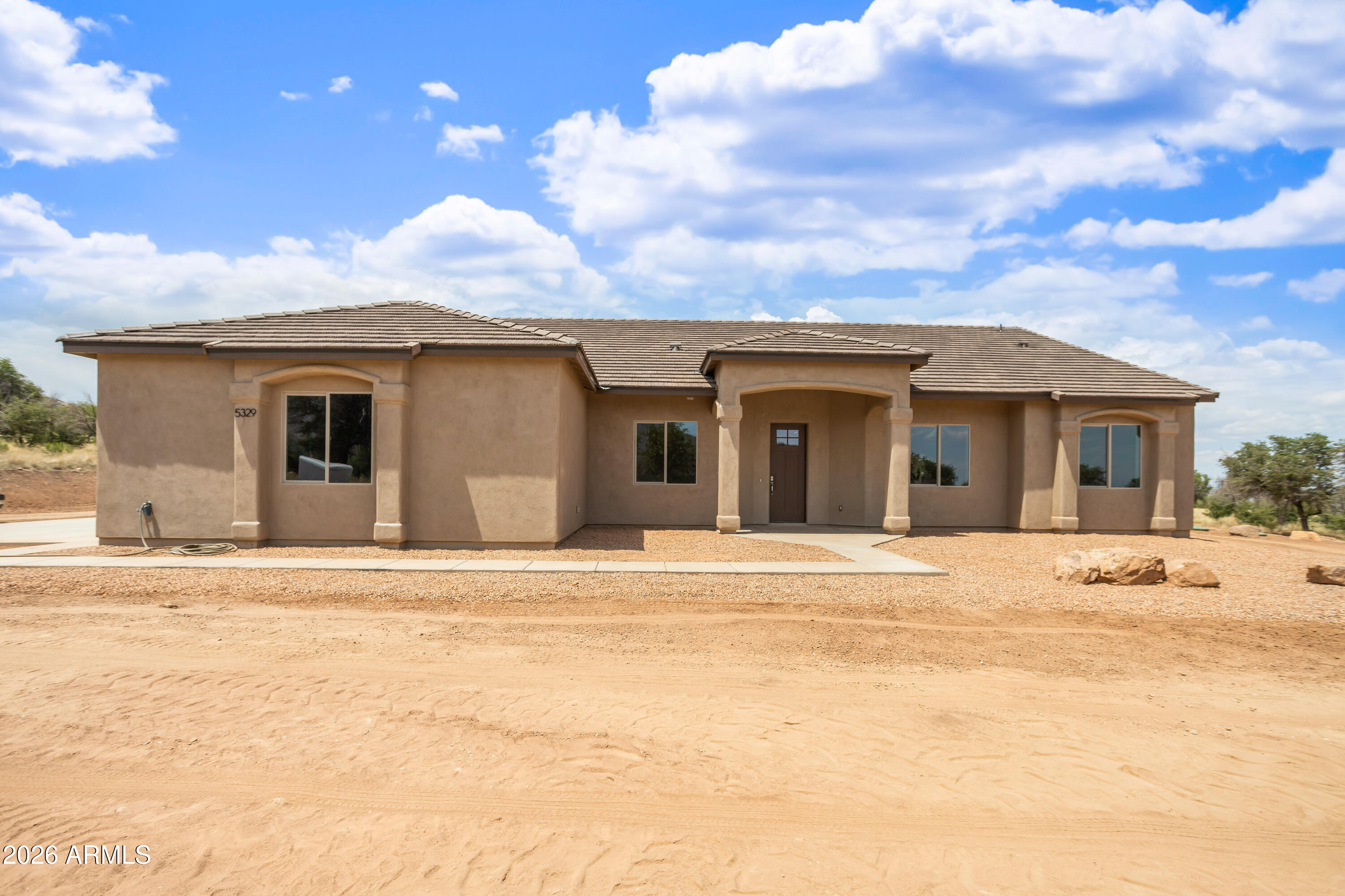 Nestled in the desirable Oaks Subdivision, this stunning New Construction 4-bedroom, 2-bathroom home offers 2,607 sq ft of thoughtfully designed living space on a peaceful corner lot surrounded by breathtaking mountain views. Featuring an extended 3-car garage, covered back patio, and an open-concept floor plan, this home blends comfort with modern style.  The interior showcases elegant 12x24 tile flooring throughout, beautiful granite countertops, stylish two-tone paint, custom cabinetry, and spa-inspired tiled showers accented with granite details. Designed with both functionality and luxury in mind, this home is the perfect combination of quality craftsmanship and scenic living. Seller is offering Concessions at COE  with an acceptable offer.