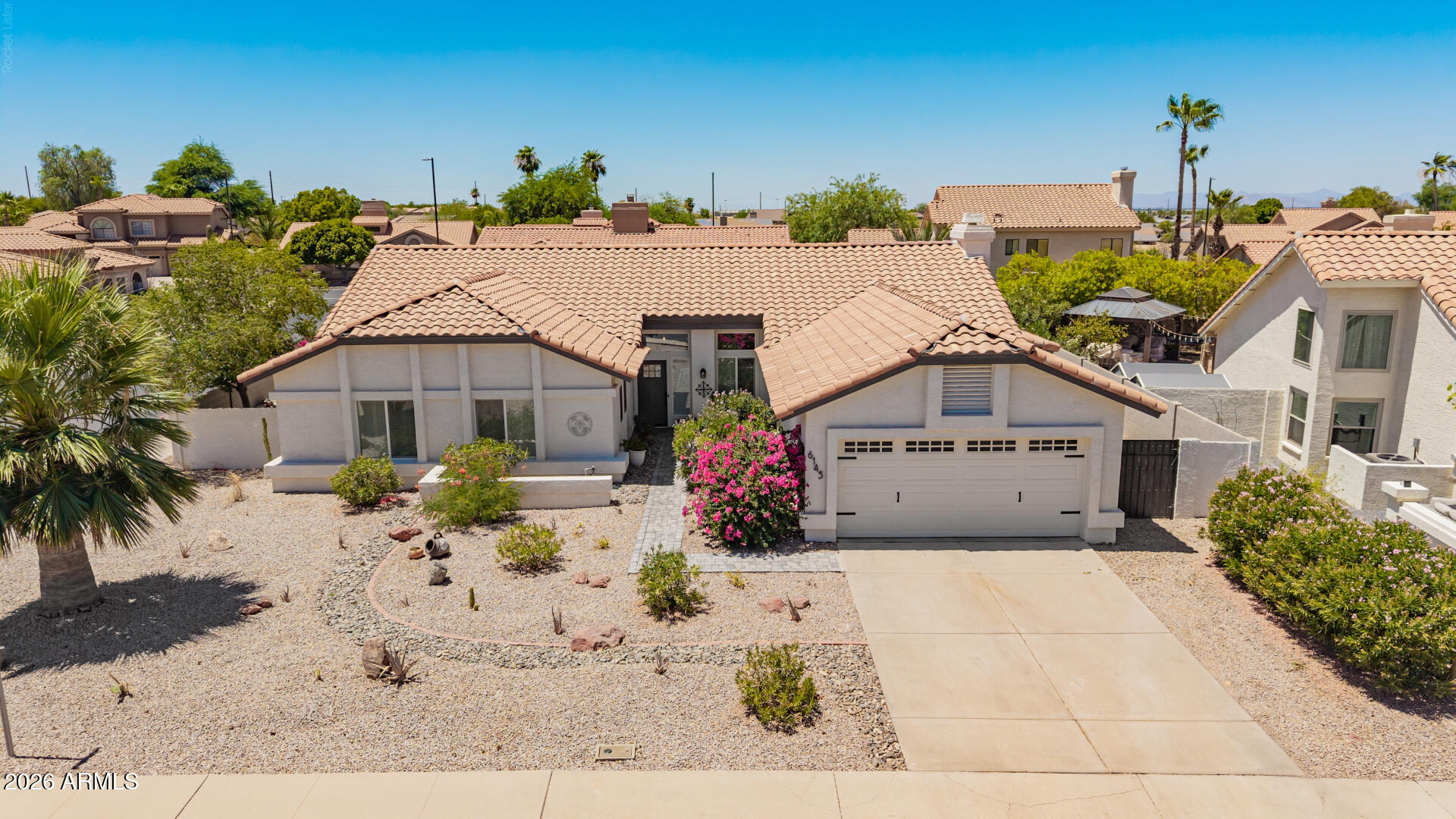 Summer is calling! Enjoy a brand-new sparkling pool perfect for entertaining, family gatherings, and relaxing in the Arizona sunshine. This immaculate corner-lot home in Red Mountain Estates is move-in ready and features vaulted ceilings, updated lighting, a beautifully remodeled kitchen with quartz countertops, a large island, pendant lighting, and updated bathrooms. The charming updated primary suite and built-in kitchen nook add warmth and character. Outside, enjoy a covered paved patio (living space) & new misting system. Minutes from Loop 202, PHX & Mesa Gateway Airport, shopping, dining, Saguaro Lake, Salt River recreation, hiking, biking, & access to community golf course, pickleball, fitness center, country club and additional community amenities. LET THE ADVENTURES BEGIN!