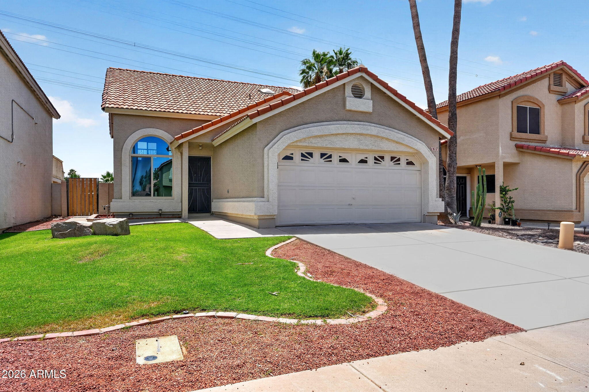 HEART OF GILBERT. --. Discover this charming remodeled 3-bed, 2-bath tri-level home! Fresh interior & exterior paint, beautiful Blond Oak wood plank floors, for energy-efficient enjoy brand-new A/C & new vinyl dual pane windows, that help create a bright, welcoming space.
The stunning kitchen features soaring vaulted ceilings, updated light fixtures, upgraded stainless steel & black appliances, and butcher block countertops all overlooking the cozy family room.
Both bathrooms have been beautifully updated with new cabinets, and tiled surround showers. Downstairs, the spacious garden-level basement offers a huge living room, two guest bedrooms, & a full bath.
Step outside to your lush green backyard--no homes behind!--with a back gate leading straight to trails at Gilbert's Freestone Par