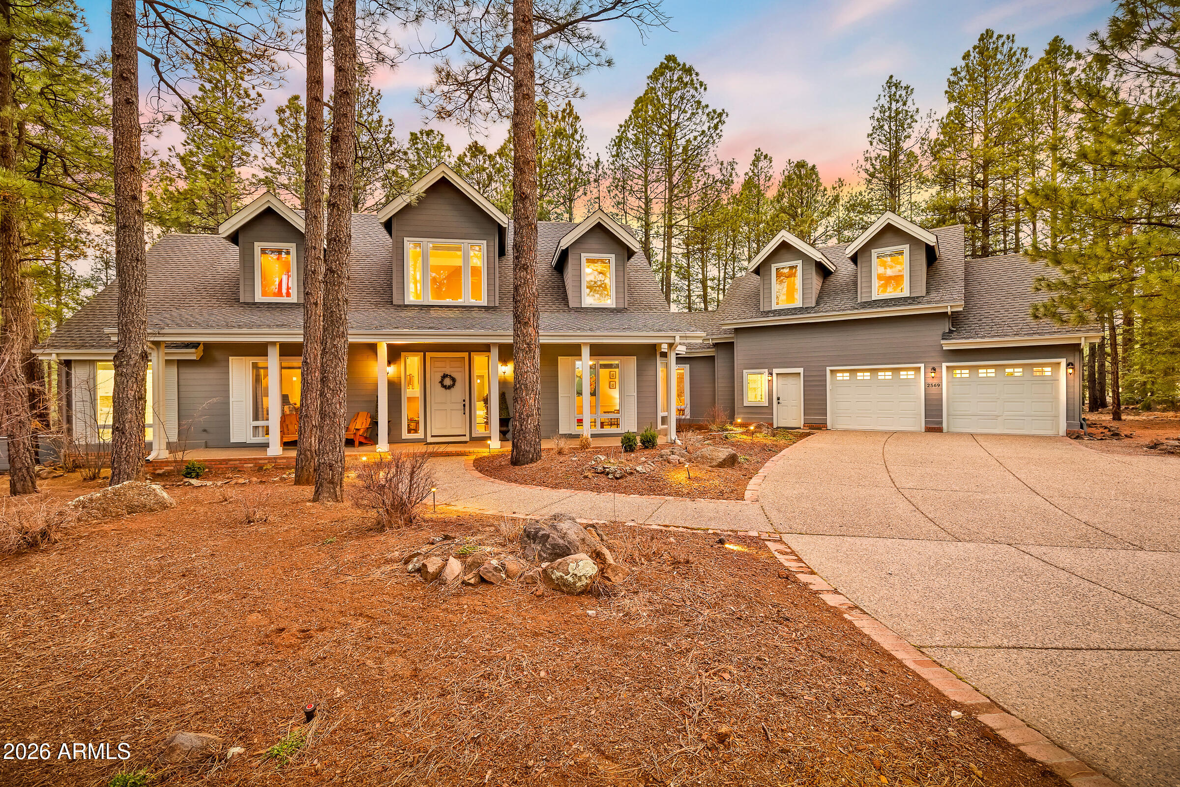 Set along the 11th fairway of the Canyon Course in the guard-gated community of Forest Highlands, this timeless mountain retreat offers the golf course setting buyers hope to find but rarely do. The split floor plan features a spacious great room, formal dining, dedicated office, oversized primary suite, and three ensuite guest bedrooms, ideal for hosting family and friends. Vaulted ceilings and hardwood floors frame the living spaces, complemented by an updated kitchen and massive primary bath. A gas fireplace, bar area, and refrigerated wine storage enhance the entertaining appeal. The covered back veranda features a wood-burning fireplace, built-in BBQ, and fairway views, perfect for summer evenings. Walk to the Stonehouse. Furnishings included.