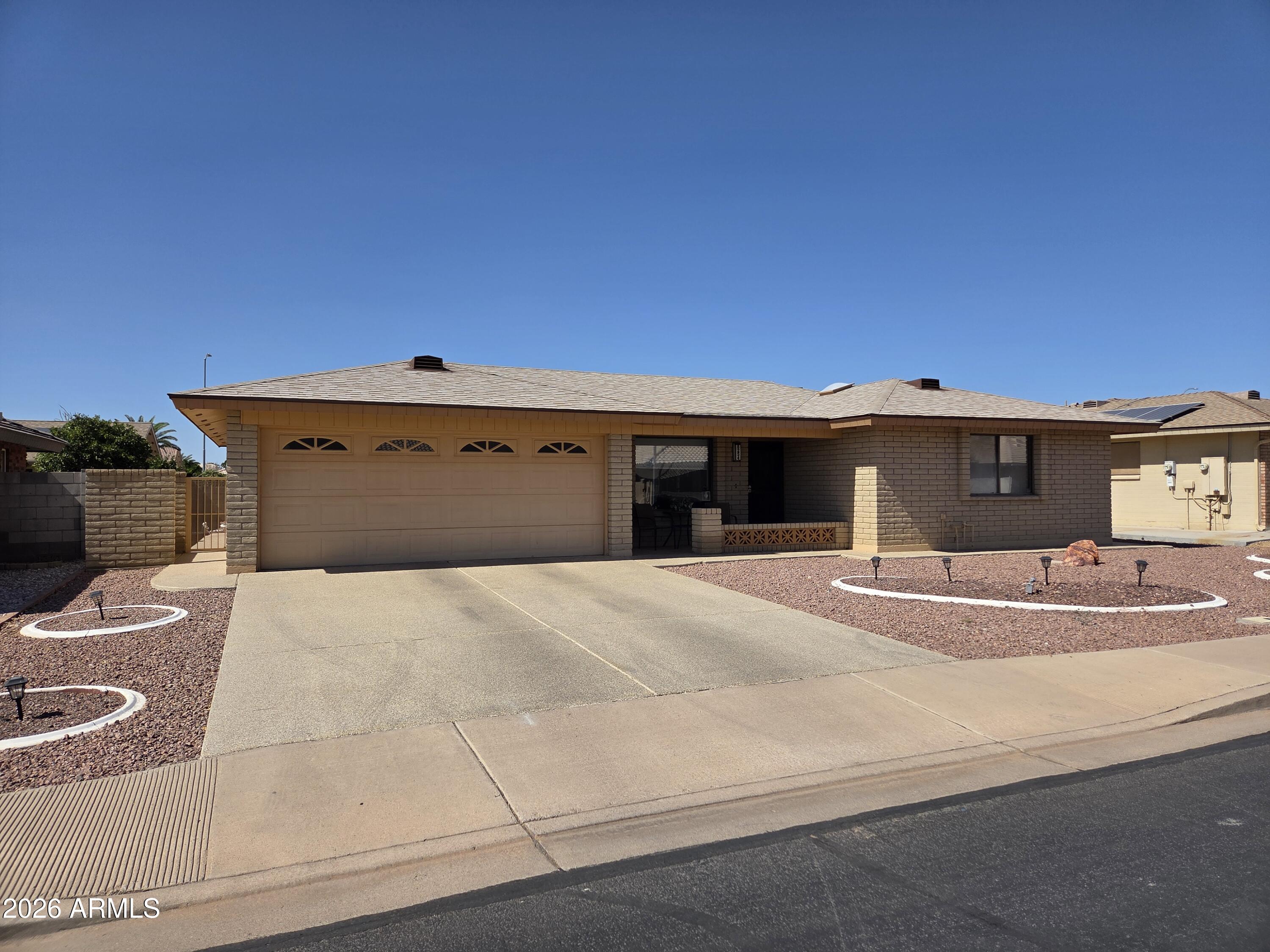Beautifully Remodeled Home in the Highly Desired Sunland Village East Community. This 2 Bedroom 2 Bathroom home offers Brand New A/C, Roof, & Water Treatment System.  Upgraded Cabinets and Counter tops.  Gorgeous Flooring, Electric Fire Place Feature. Open Floor Plan with North Facing Back Yard.  Covered Patio, 2 Car Garage.  Sun Room area was built at time of initial home construction, fits the floor plan and HVAC like its supposed to.  Low Maintenance Yard, front & Back.  No need to keep looking, this home is the one you are looking for!