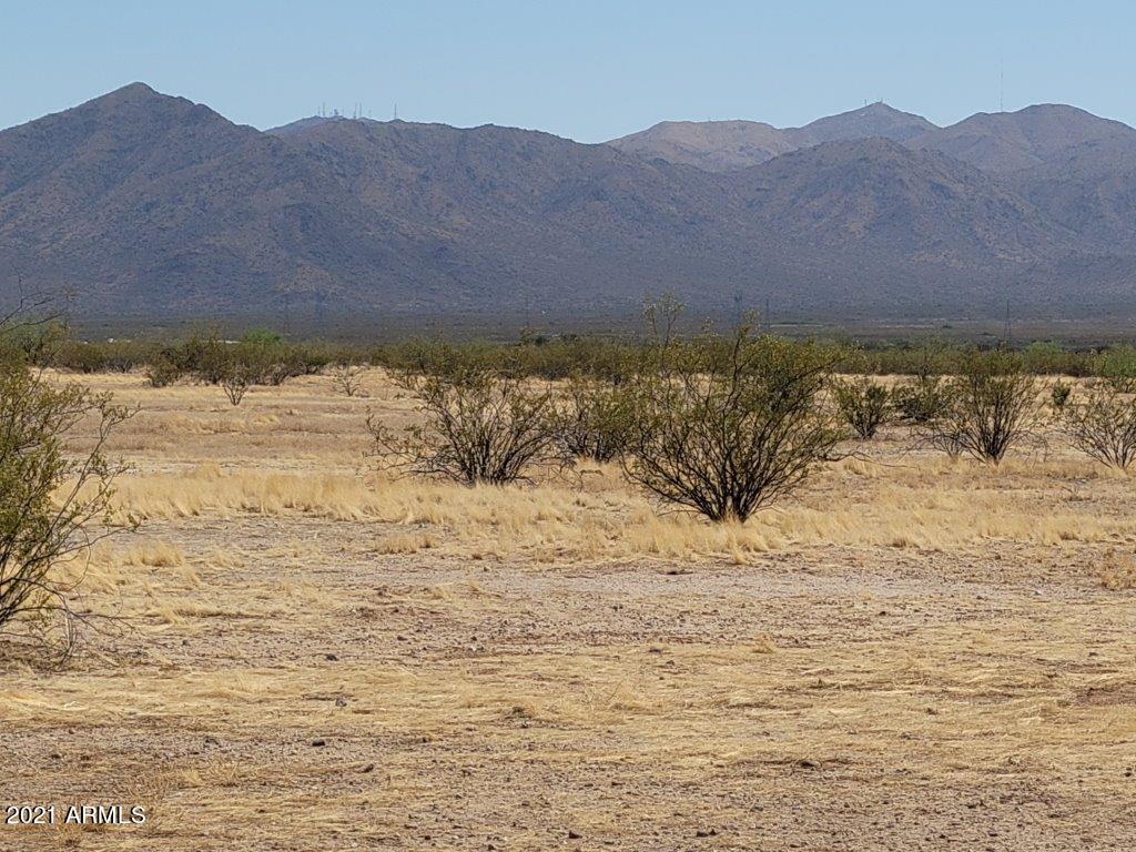 Seller Financing Available! Recently Appraised!99.39 acres located in the city limits of Surprise. The current zoning is PAD. Property backs up to the Bureau of Reclamation land and the CAP to the Southeast and is fenced on those borders. Surprise is growing with several master planned communities under construction. The land is flat and has little flood plain compared to other large properties in the area. Terms are 25% down payment, 8% interest, 3-year note amortized over 20 years with a balloon payment due at the end of the 3rd year. No pre-pay penalty. Buyer pays for account set up fee at CoE and account monthly servicing fee. Land currently has grazing status for low taxes.