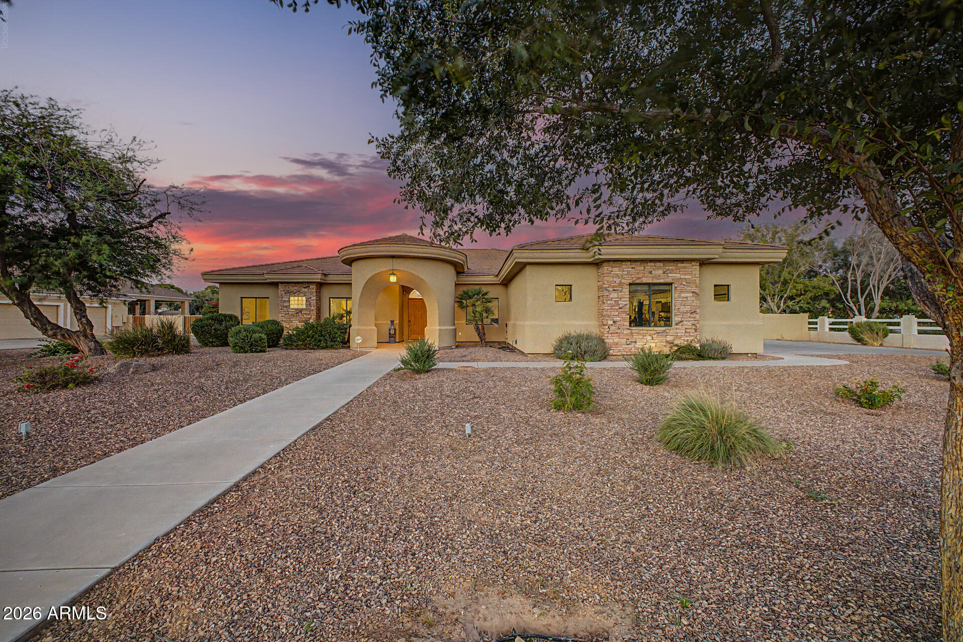This 4 bedroom/3bath custom SMART HOME is located in a quiet cul de sac in the desirable Circle G in Queen Creek. Has all the updated technology! Almost an acre of land to enjoy on a corner lot with pool, extended covered patio, BBQ, and lots of room for all your toys.
The soaring ceilings are custom with amazing details. Updates include new floor, paint, ceiling fans, and more! Very nice floor plan with large open spaces and carefully thought out large rooms sizes and areas. Oversized panty and laundry rooms for ease of living. The 3 car garage is extended and still plenty of room for work area and oversized vehicles. Come check it out!