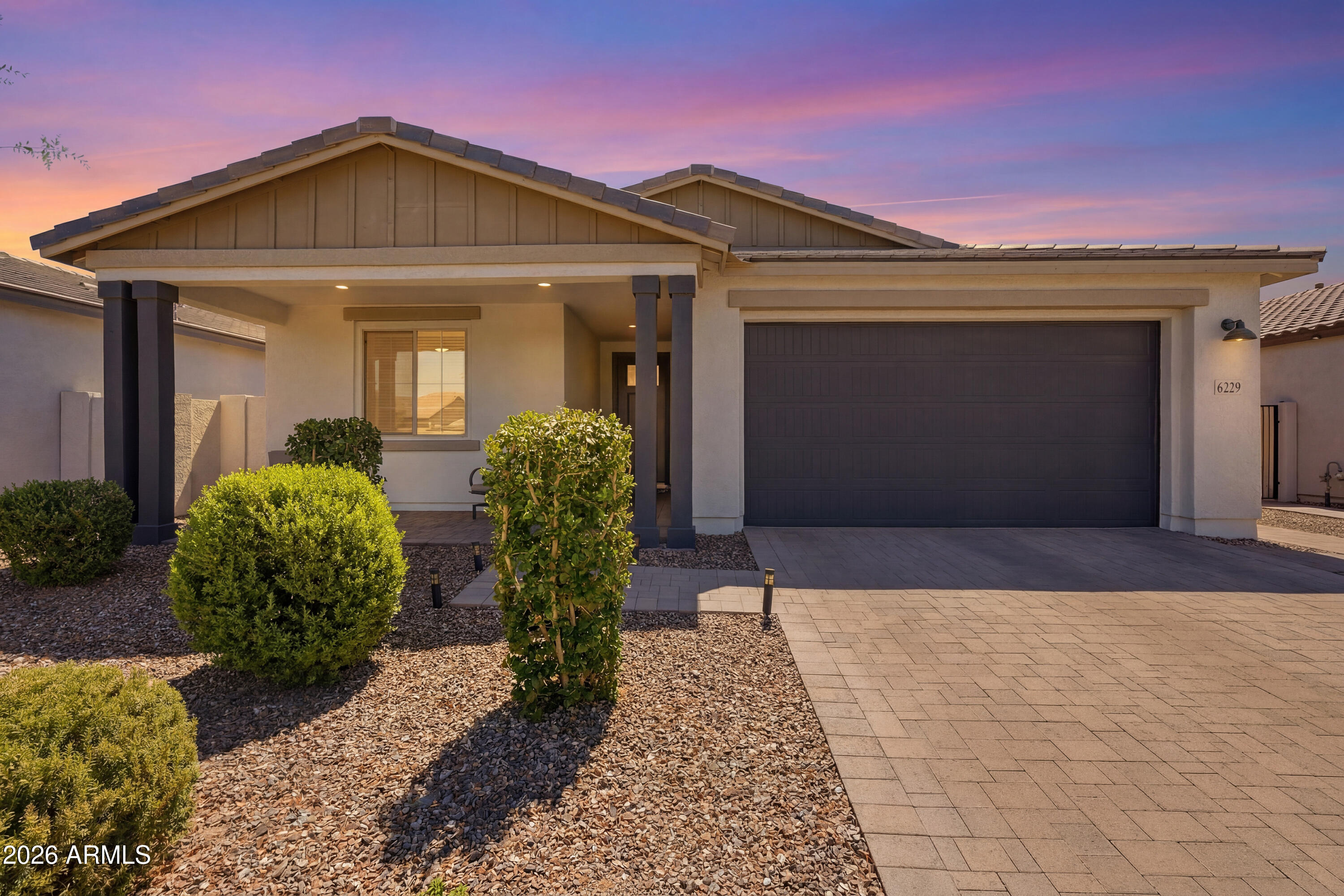 WELCOME HOME to this STUNNING, bright and open concept floor plan in the East Valley's coveted Destination at Gateway! METICULOUSLY cared for, this 4 bedroom/3 bath model like home spares no missed detail. Featuring A MOTHER-IN-LAW SUITE perfect for family, guests, a home based business or family headquarters! Thoughtful upgrades including flooring and accent walls give this home so much charm!l Large entertainer's modern chef kitchen boasts extra cabinets, granite countertops, walk in pantry and large island with breakfast bar. Private backyard is perfect with no neighbors behind. The community is in one of the valley's hottest zip codes with growth and opportunity galore. Close to freeways, dining, shopping and great school choices. This home is a MUST SEE!