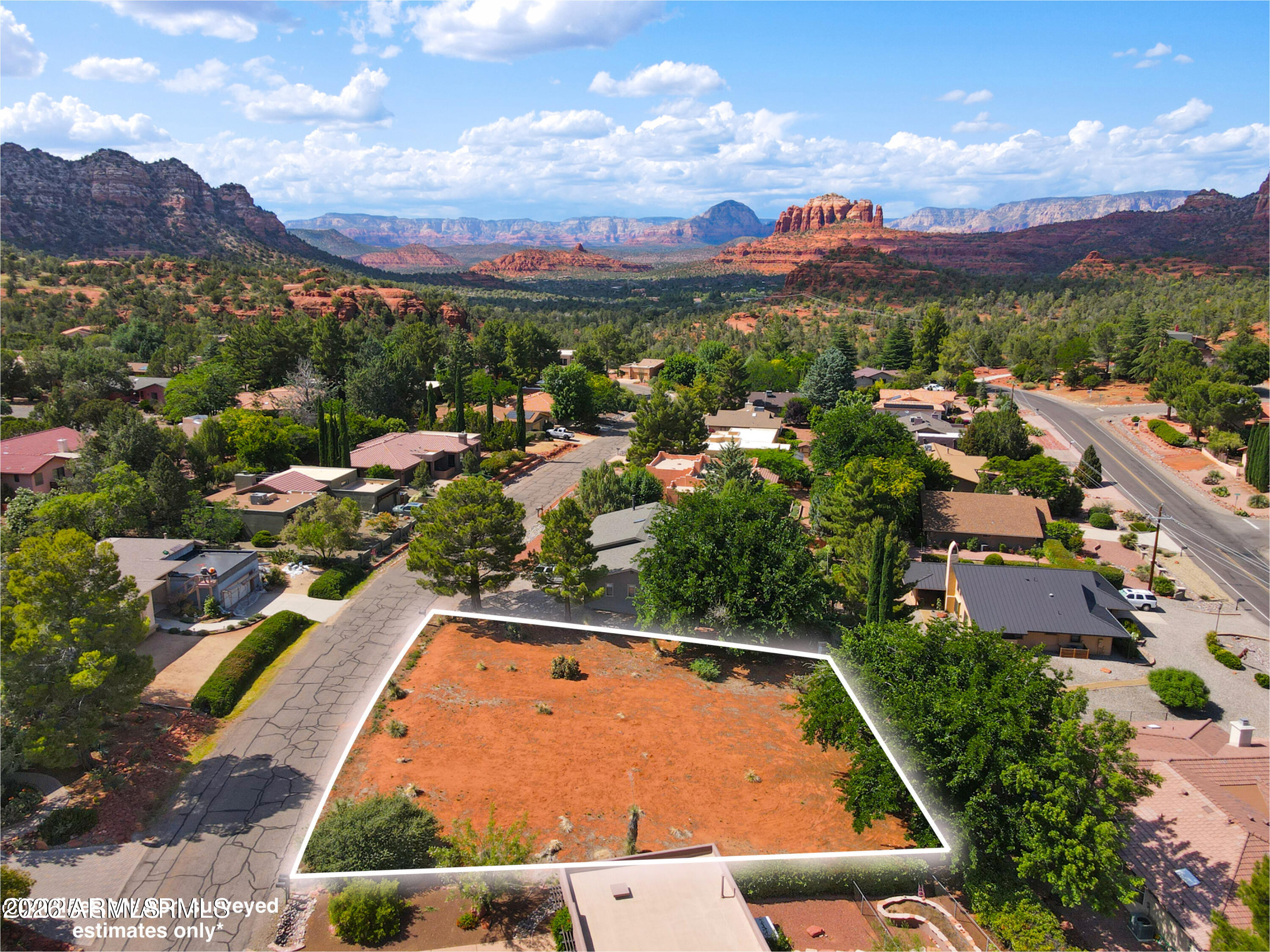 Discover one of the last remaining lots in the highly sought-after Oak Shadows neighborhood in the Village of Oak Creek. This level, easy-to-build 0.28-acre parcel has already been cleared and is ready for your dream home. Enjoy breathtaking views of Courthouse Butte and direct access to nearby neighborhood hiking trails. Located just minutes from the waters of Oak Creek, this quiet, established community offers unmatched access to scenic hiking and biking trails, premier golf courses, and a variety of shopping and dining options. Utilities are nearby (buyer to verify).

Opportunities like this are rare. Act now and build your dream home in one of Sedona's most desirable areas. Short-term rental possible.