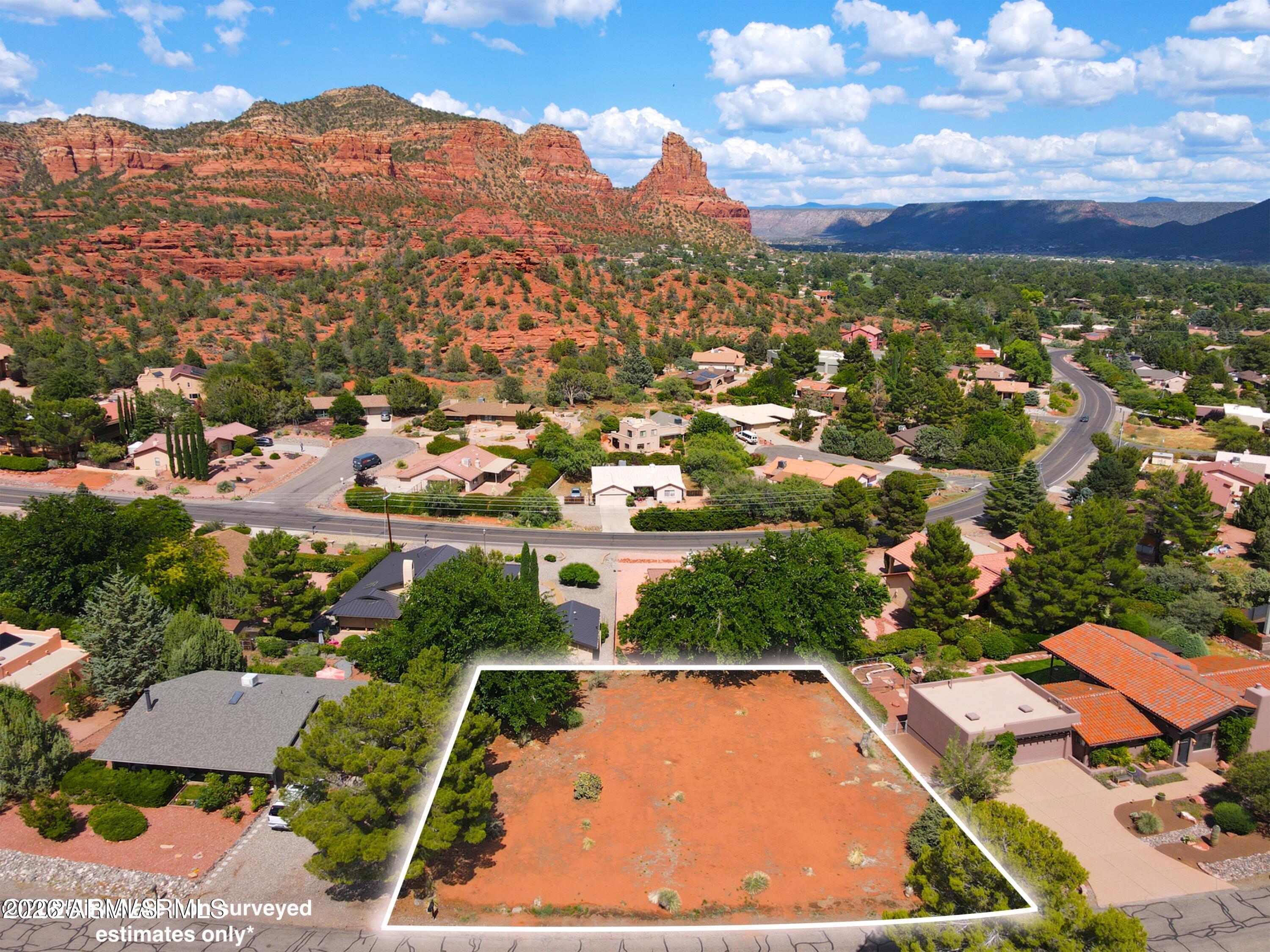 Discover one of the last remaining lots in the highly sought-after Oak Shadows neighborhood in the Village of Oak Creek. This level, easy-to-build 0.28-acre parcel has already been cleared and is ready for your dream home. Enjoy breathtaking views of Courthouse Butte and direct access to nearby neighborhood hiking trails. Located just minutes from the waters of Oak Creek, this quiet, established community offers unmatched access to scenic hiking and biking trails, premier golf courses, and a variety of shopping and dining options. Utilities are nearby (buyer to verify).

Opportunities like this are rare. Act now and build your dream home in one of Sedona's most desirable areas. Short-term rental possible.
