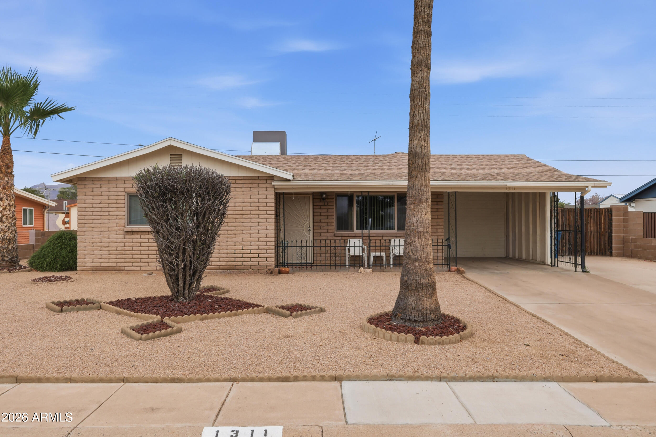 Discover 55+ living with NO mandatory HOA in Apache Villa! This unique 1,786 SQFT furnished home offers a spacious 1,536 SQFT main home plus a 250 SQFT mother-in-law suite with a separate entrance--perfect as a guest suite, caretaker suite or hobby space. With a total of 3 beds and 3 baths, a large family room addition, and a water softener, there is room for everyone.

Major updates provide total peace of mind: HVAC (2021), Water Heater (2022), and dual-pane windows. The sprawling backyard is a dream, featuring a covered patio, storage shed, and dedicated RV parking with a pad. 

Join an active 55+ community known for its hiking groups, jam sessions, and social breakfasts. Located in Apache Junction near the Superstition Mountains, you're minutes from shopping, dining, and adventur