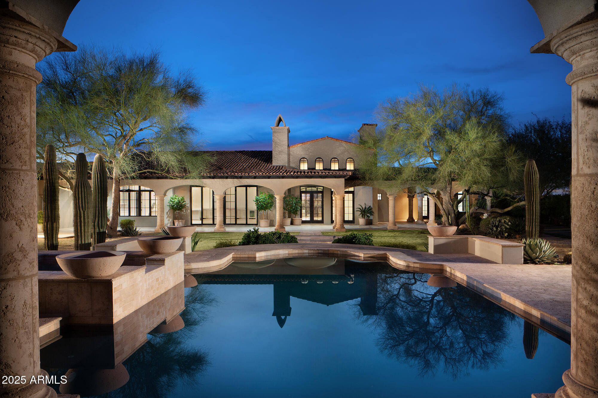 Complete Remodel on this 4.3 acre European style estate located in the gated community of Prado where every home has large separation and privacy from its neighbors. Quality and extravagant features abound in this home including new kitchen, updated baths, exposed beams ceilings, stone fireplaces and new wood floors. The grand entrance foyer leads into a formal living room with views of the sparkling pool. The formal dining room is stunning. The family room opens to the new kitchen and breakfast room. The estates has a total of 9,449/sf of including the 8,153/sf five bedroom main house and a spacious 1,296/sf two bedroom guest house with living area & fireplace. The lighted tennis court, putting green and sparkling pool, spa & cabana highlight the grounds. 5 car garage with room for more