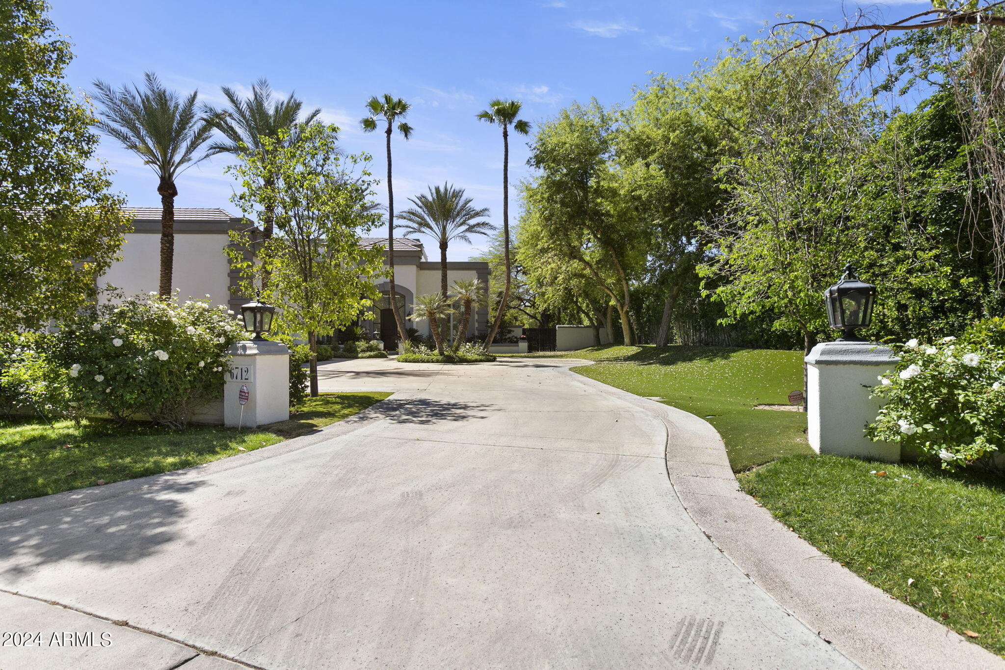 BACK FROM SOLD, buyer did not perform. Timeless, PV estate crafted for gracious living in prestigious La Place. Floorplan is designed with large windows throughout to create a resort-worthy ambience & to appreciate the magnificently landscaped acre+ grounds w/ pool and tennis court. Architectural details, ceiling treatments & quality finishes thruout. 4 BRs, each with an en suite bath, walk-in closet and private exit, plus a study, game room and 1600 sf lower level entertainment room. Elevator leads to the dream main retreat upper level w/ dual closets and a deck spanning the rear of the home. Main living areas & main retreat were reimagined in 2017 by a noted designer. 3 gas fireplaces. Extensive security system w/ multiple cameras indoors and outdoors. See Docs for floor plan and more.