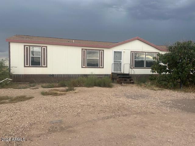 New flooring throughout, Central A/C 1768sq. ft. Fleetwood home. on V.A. Foundation 4 Bedroom 2 bath 2+Acres fenced lot. Off paved road.