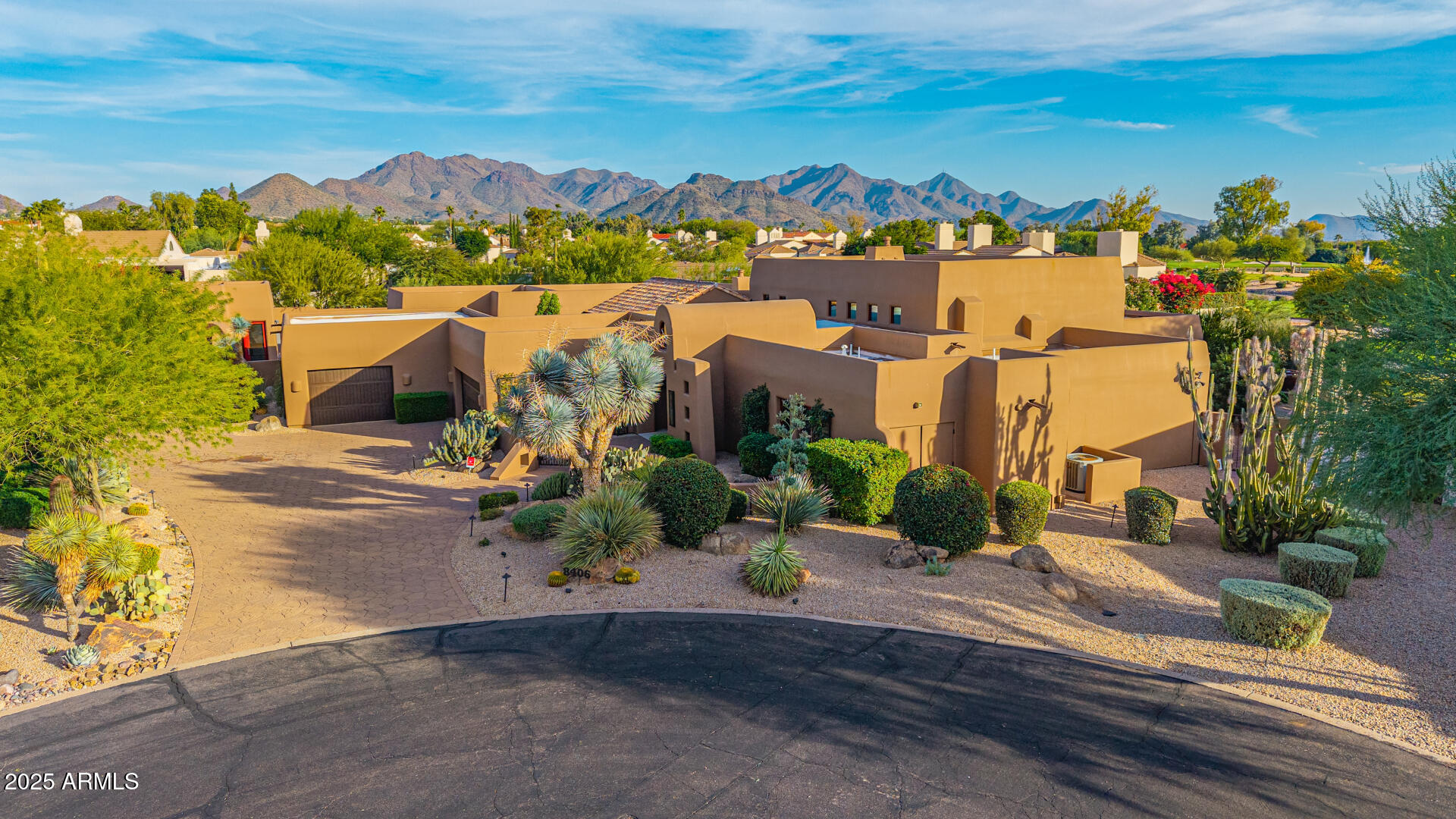 Welcome to an architectural masterpiece that defines Scottsdale's signature blend of sophistication, desert beauty, and resort-style living. Perfectly positioned on three breathtaking fairways within the prestigious Pinnacle Peak Country Club Estates, this one-of-a-kind residence offers a lifestyle reserved for those who seek the extraordinary.

From the moment you step inside, you're enveloped in timeless elegance—where handcrafted details and modern innovation meet. The grand living room features a hand-set groin mosaic stone ceiling and an automated wall of glass that opens to sweeping golf course vistas, seamlessly connecting indoor and outdoor living spaces.

The main home offers 3 bedrooms, 3.5 baths, a private gym, office, 3 fireplaces, and a 3-car garage, while the detached guest casita provides a complete retreat with its own living room, bedroom, and bathideal for guests, in-laws, or extended stays.

The primary suite is an indulgent escape with a slate-accented fireplace, an expansive three-aisle walk-in closet, and a spa-inspired bath featuring a slipper tub, dual vanities, and fireplacecreating an intimate oasis of relaxation.

Designed for the culinary enthusiast, the gourmet kitchen boasts Iron Red granite countertops, soapstone backsplash, 6-burner Wolf range, Sub-Zero refrigerator, Miele dishwasher, built-in microwave, and walk-in pantry. The open layout flows into the dining and living areas centered around a striking dual-sided gas fireplaceperfect for elegant entertaining or cozy evenings at home.

Outside, experience Scottsdale's famed indoor-outdoor lifestyle in your resort-style backyard, complete with multiple patios, a gas firepit, built-in BBQ, spool with water feature, and abundant seating areas for gatherings large or smallall overlooking lush fairways and spectacular sunsets.

Living in Pinnacle Peak Country Club Estates means more than owning a homeit's belonging to one of Scottsdale's most prestigious golf communities, where privacy, security, and camaraderie are part of everyday life. Enjoy easy access to world-class golf, upscale shopping and dining, hiking trails, and the convenience of Loop 101all just minutes away.

For those who seek the very best of Scottsdalewhere luxury meets lifestylethis home is your pinnacle.